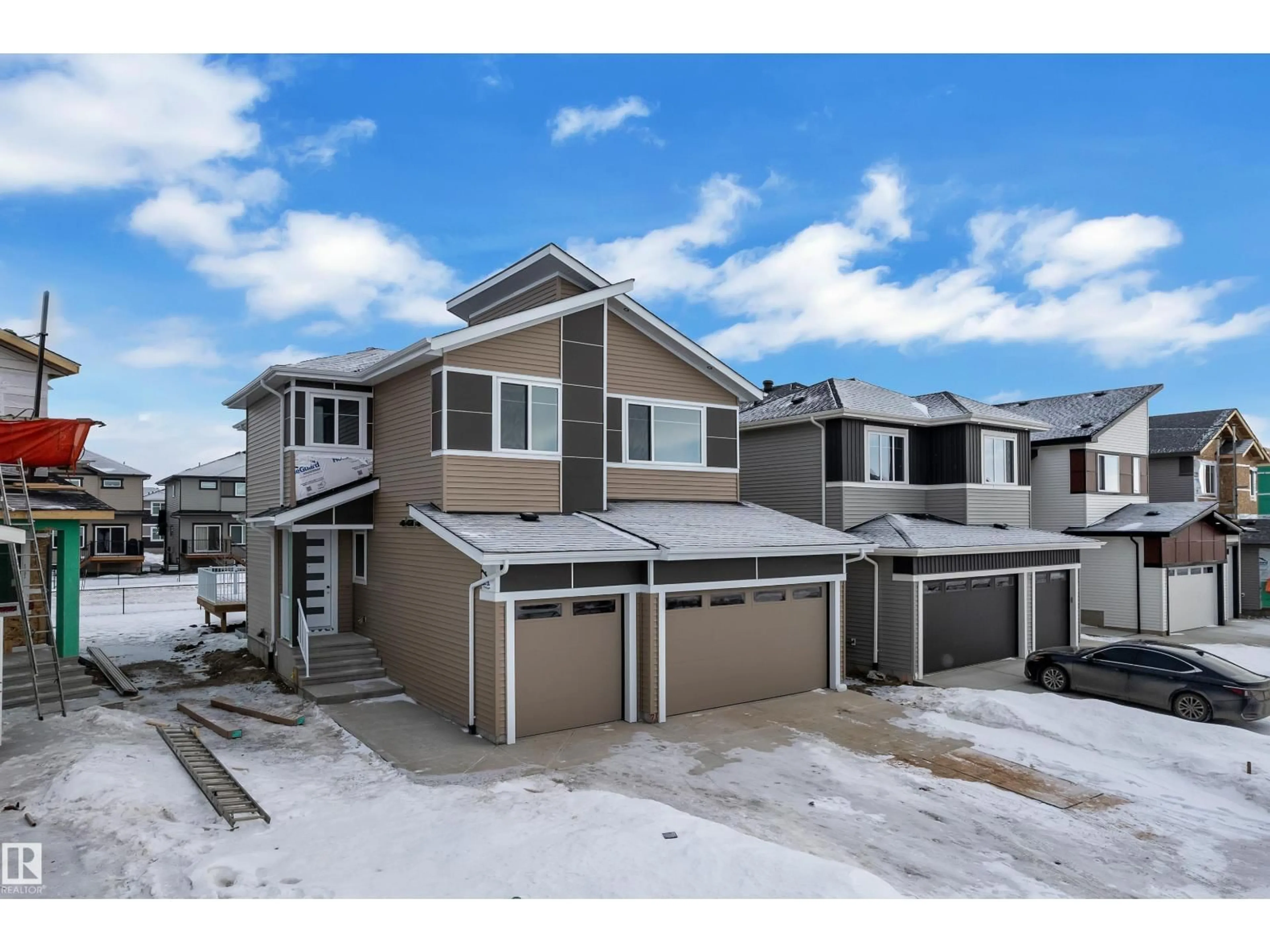 A pic from outside/outdoor area/front of a property/back of a property/a pic from drone, street for 211 BASIN CO, Leduc Alberta T9E1T6