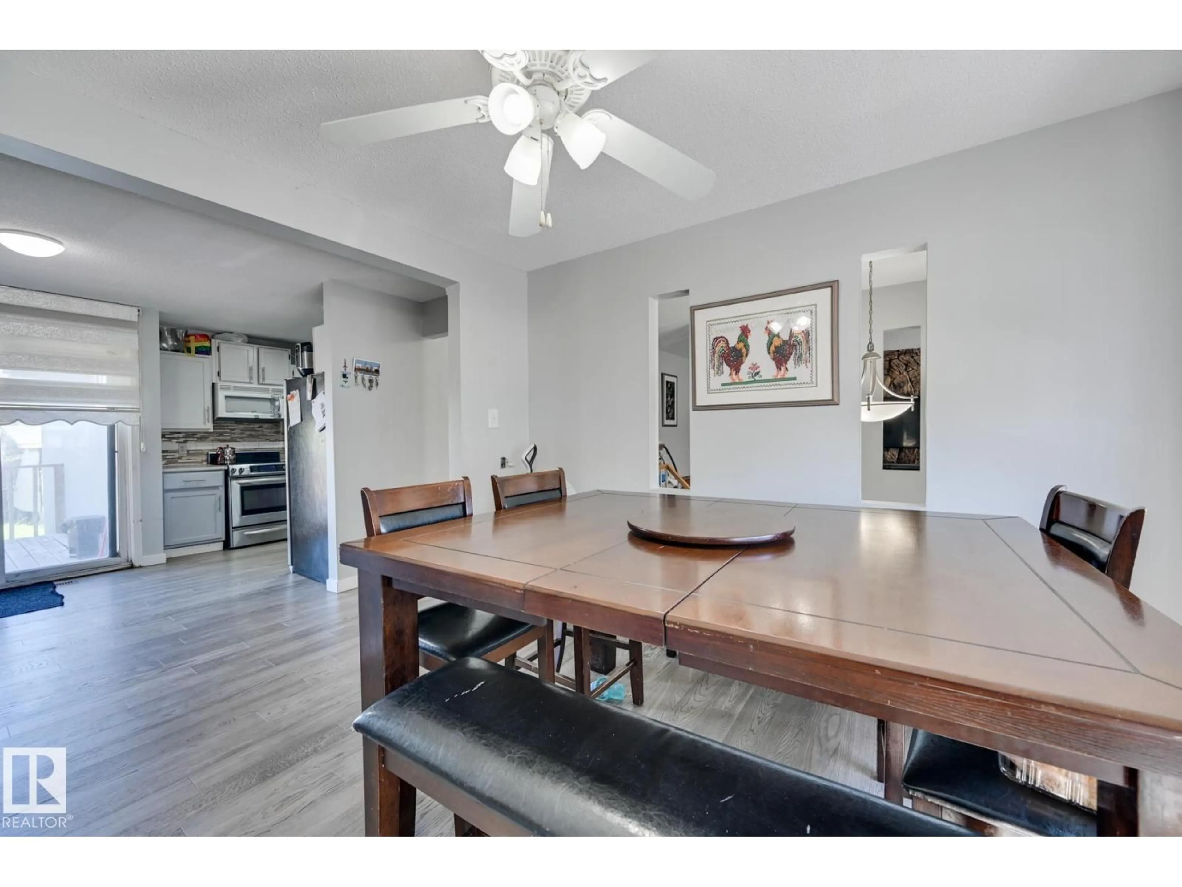 Dining room, wood/laminate floor for 4628 37 AV, Edmonton Alberta T6L3V1
