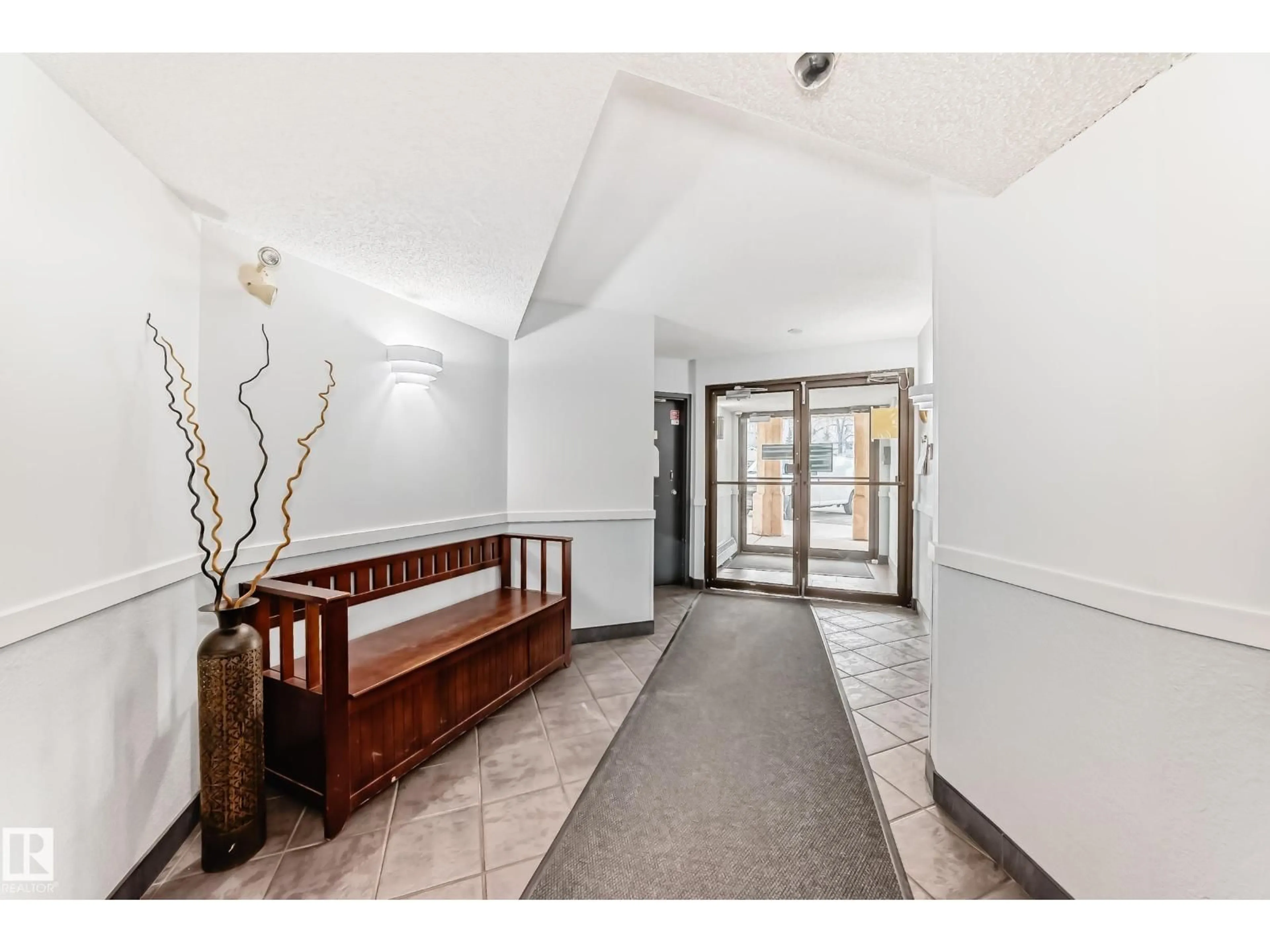 Indoor foyer for 239 - 10636 120 ST, Edmonton Alberta T5H4L5