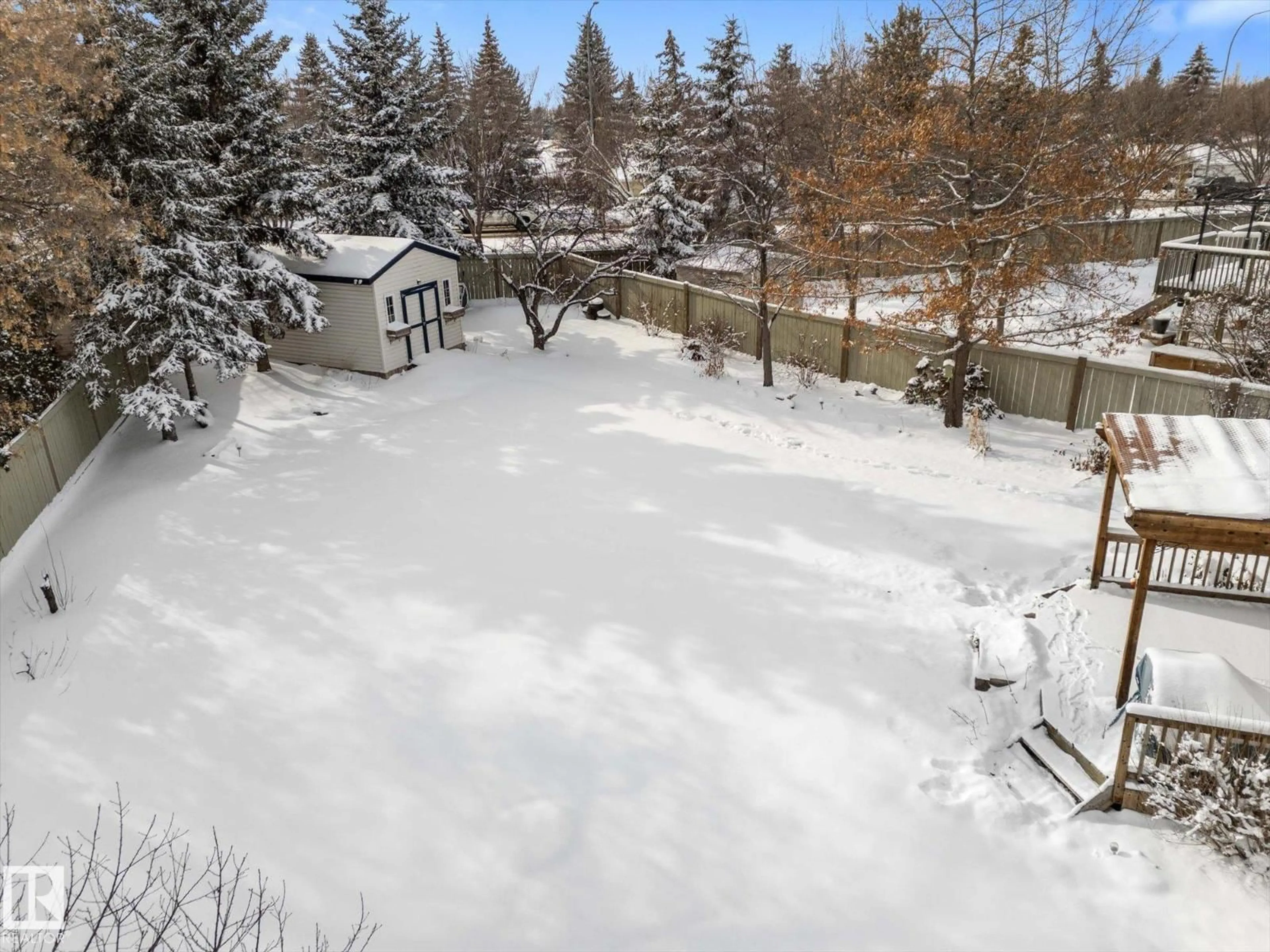 A pic from outside/outdoor area/front of a property/back of a property/a pic from drone, forest/trees view for 31 LAKEWOOD COVE, Spruce Grove Alberta T7X4B4