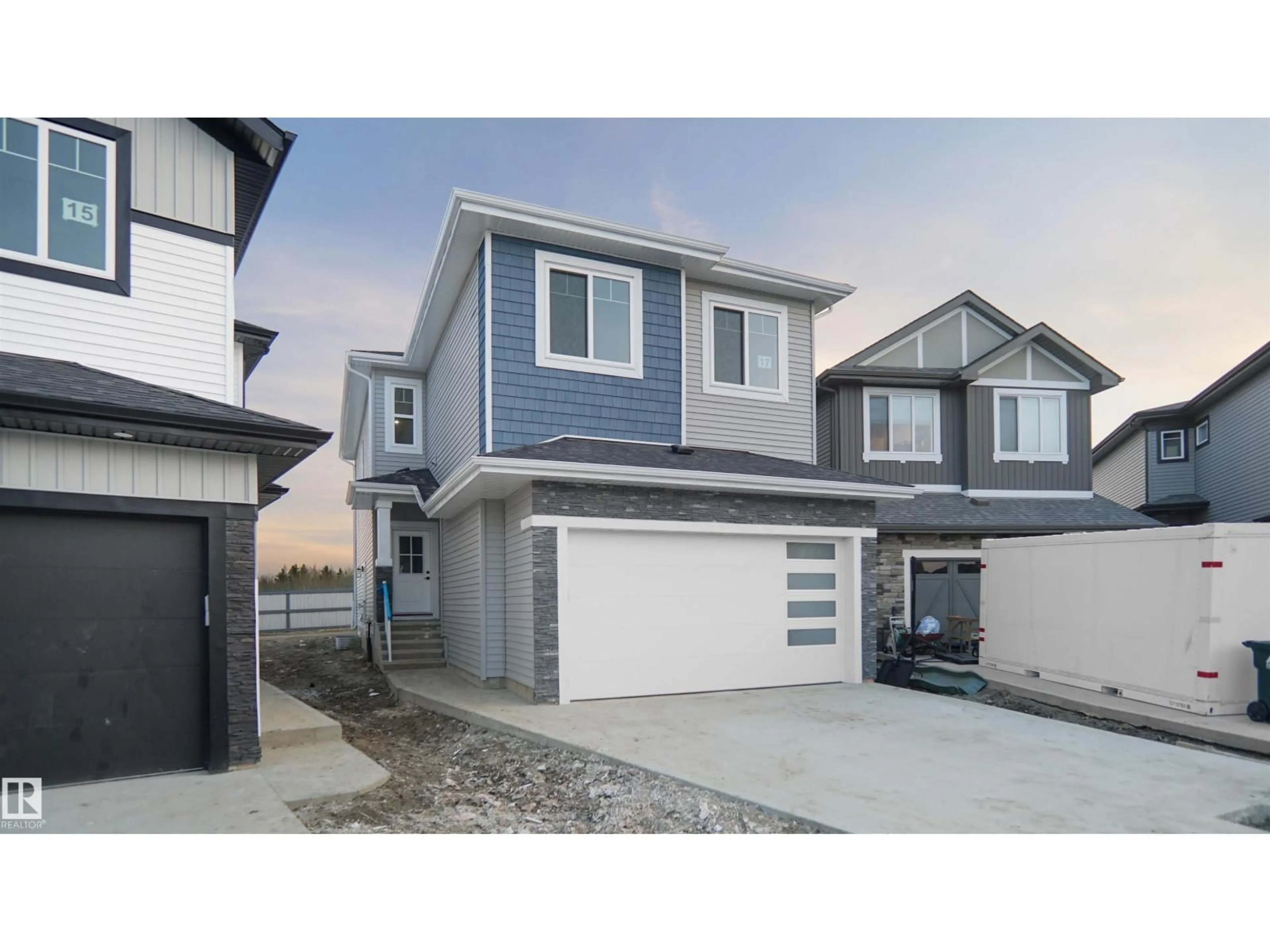 Home with vinyl exterior material, street for 45 MEADOWGROVE LN, Spruce Grove Alberta T7X0W2