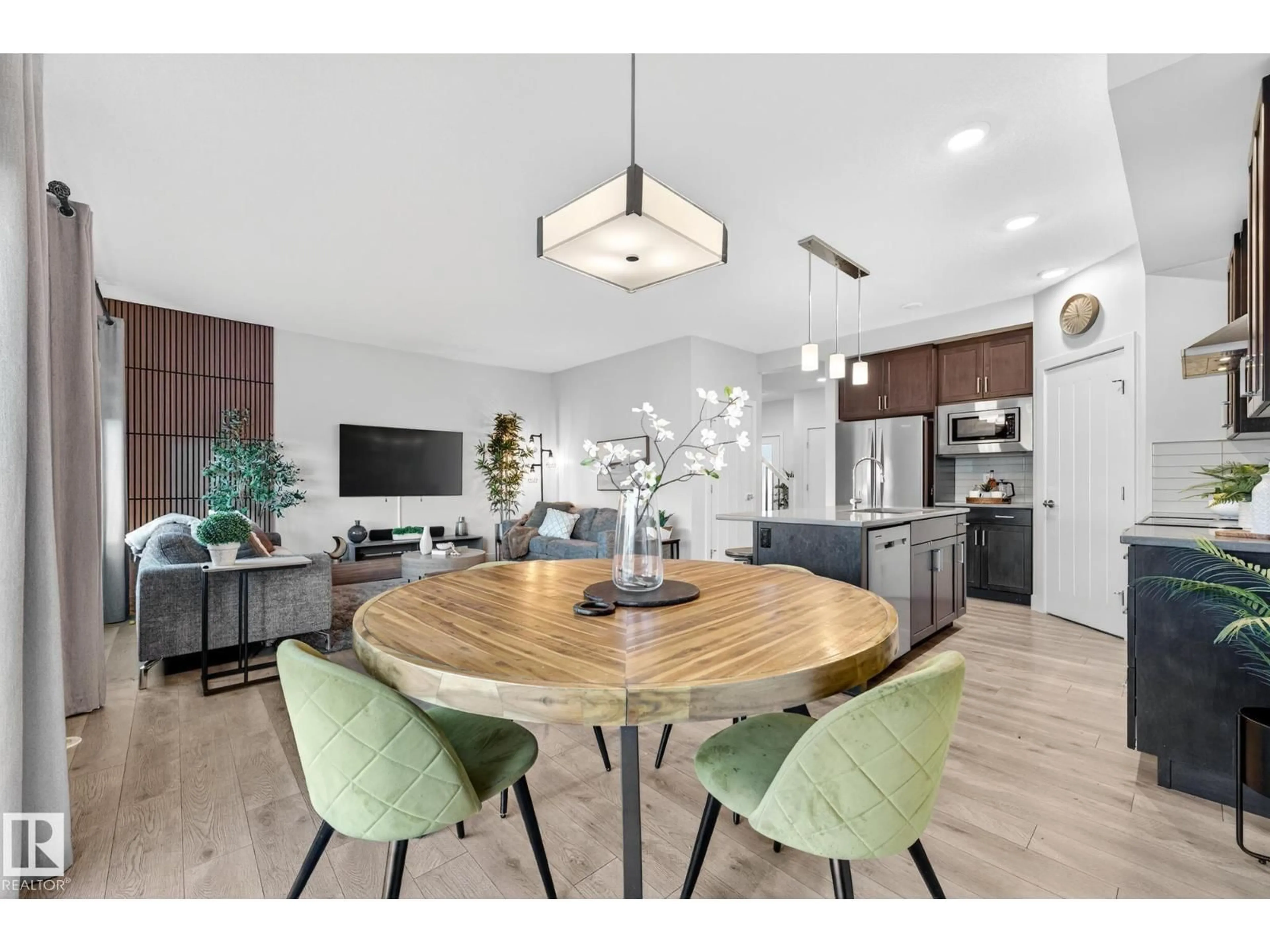 Open concept kitchen, wood/laminate floor for 1803 DUMONT CR, Edmonton Alberta T6W3V8