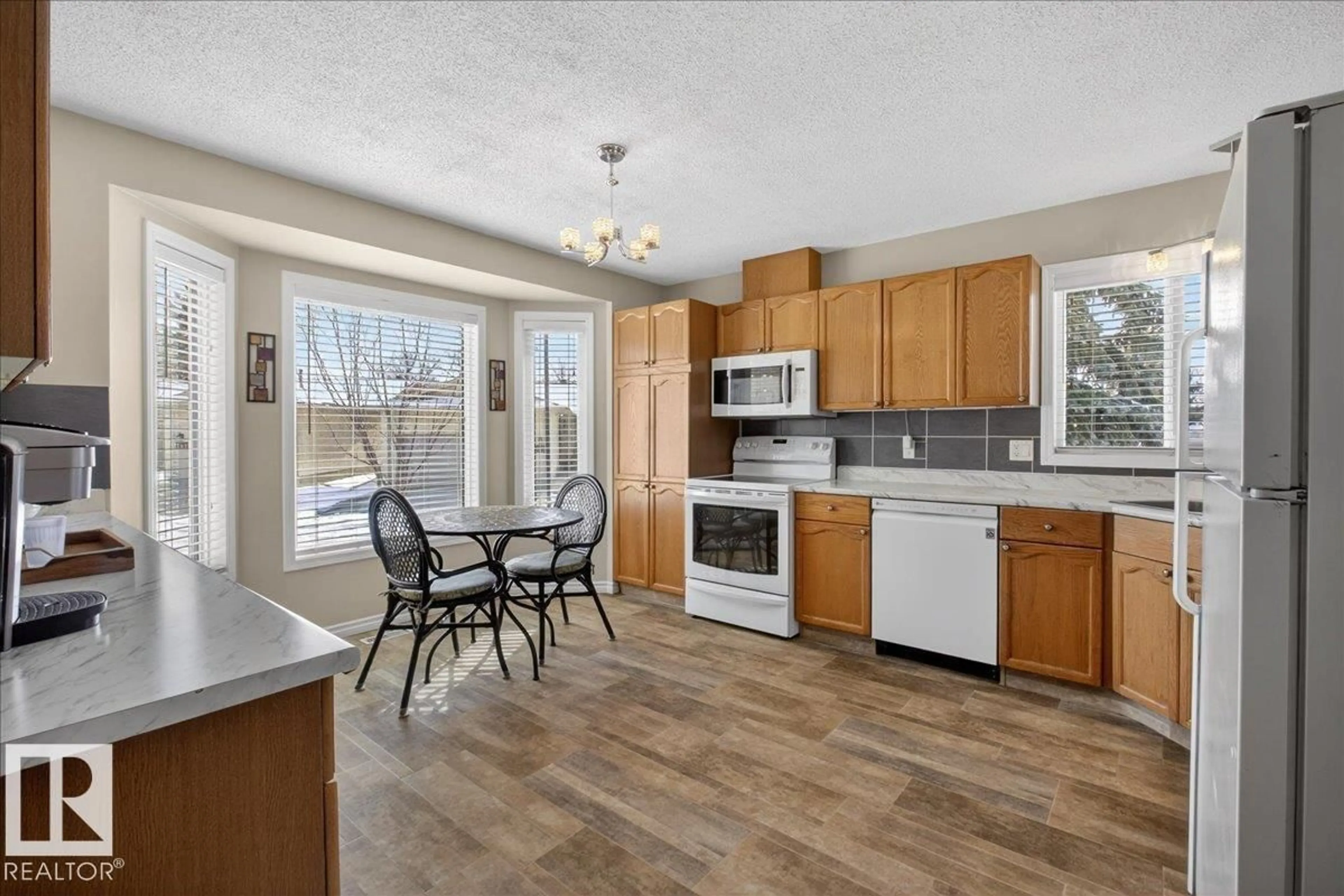 Open concept kitchen, unknown for 227 KNOTTWOOD RD, Edmonton Alberta T6K4B9