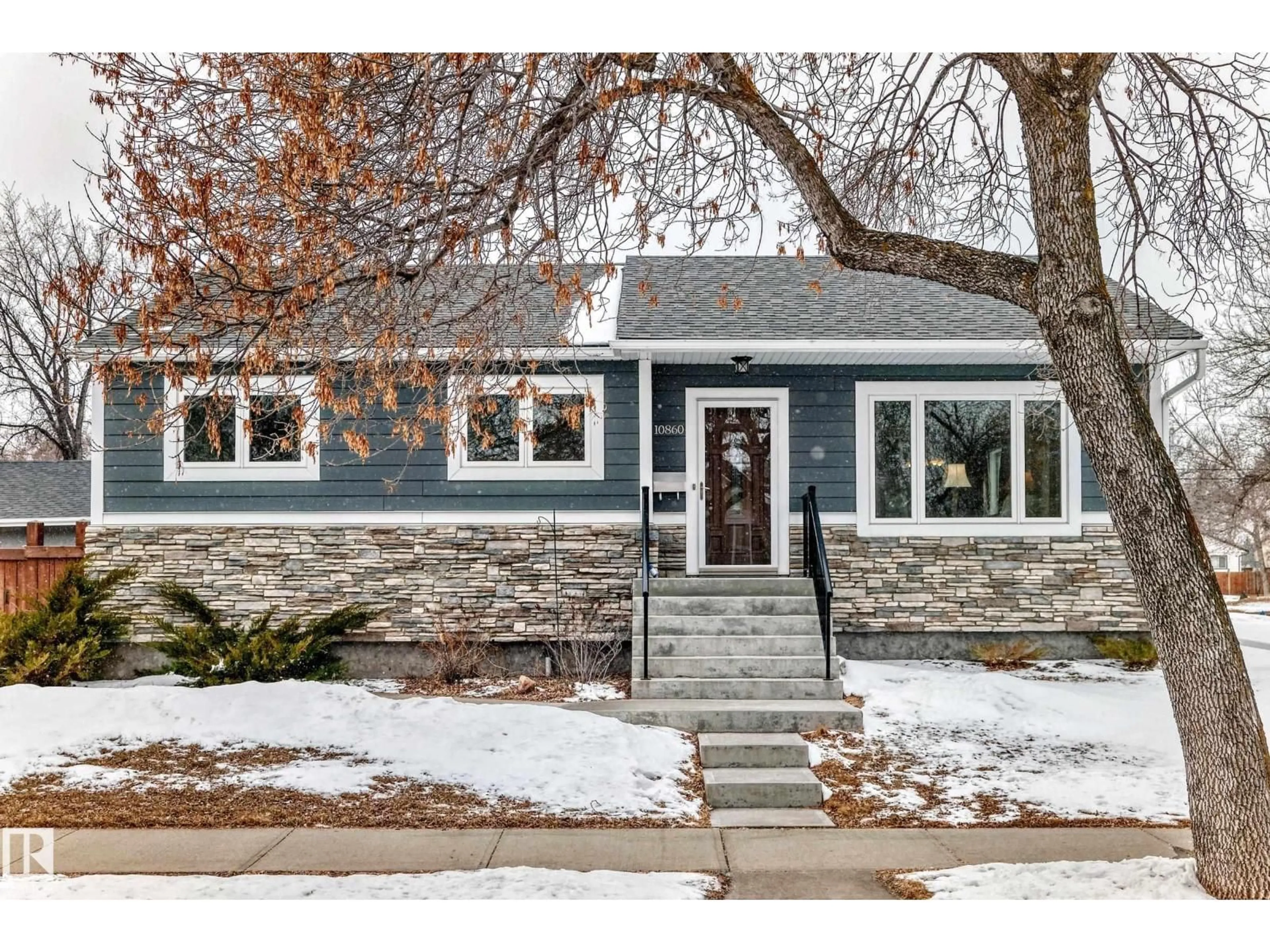 Home with brick exterior material, street for NW - 10860 147 ST, Edmonton Alberta T5N3E2