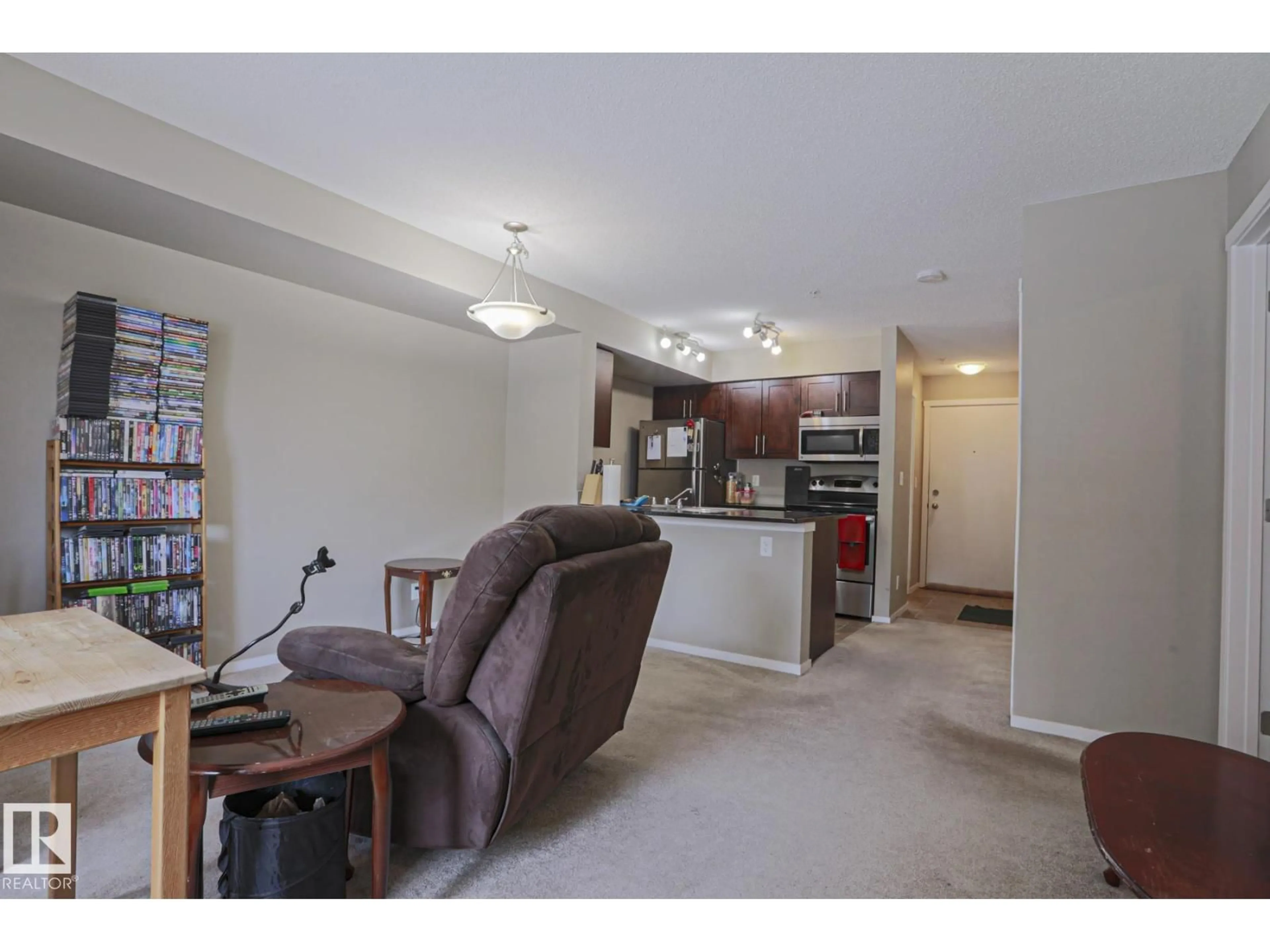 Living room with furniture, unknown for 3207 - 110 JAMES MOWATT TR, Edmonton Alberta T6W3L6