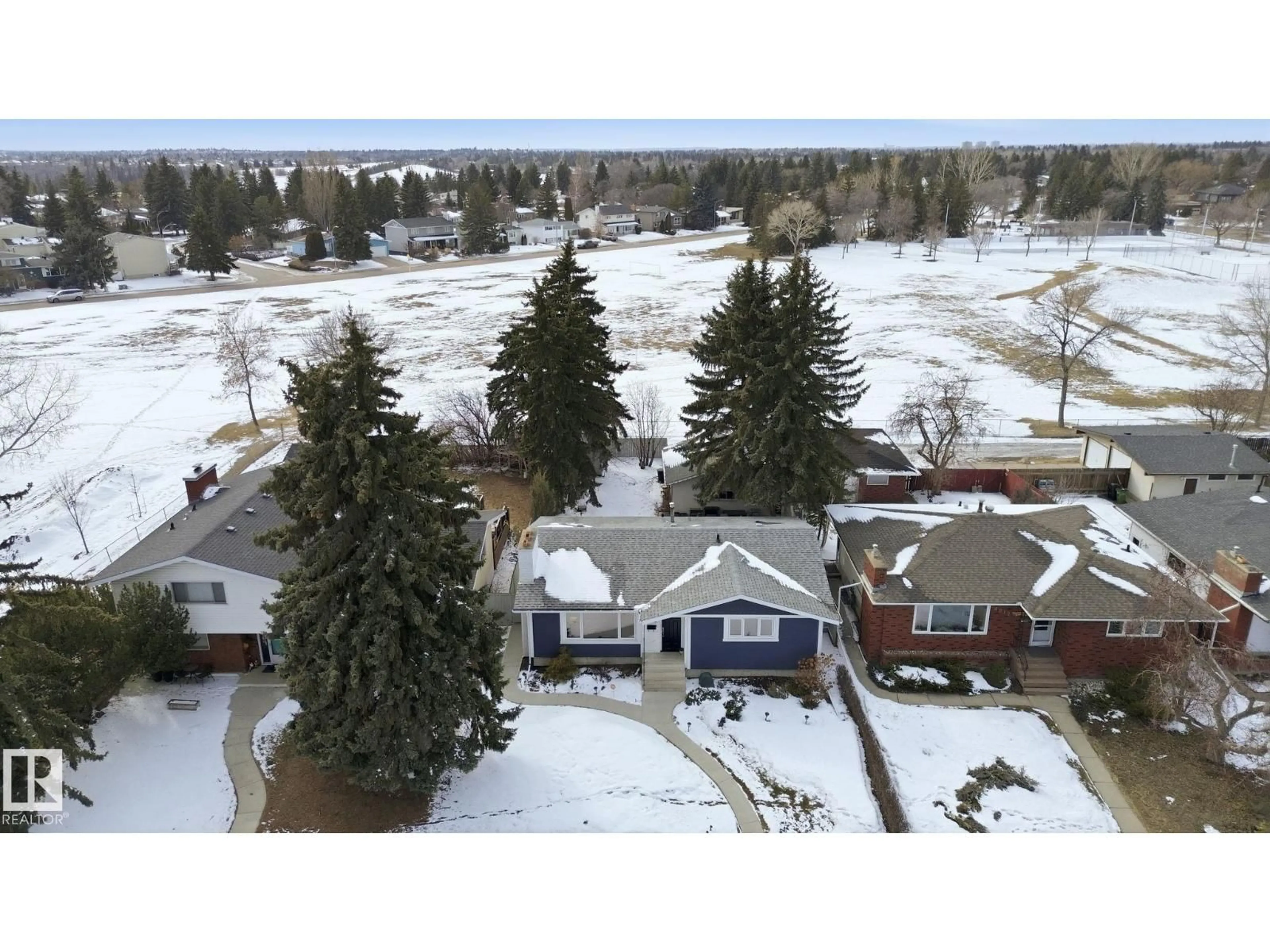 A pic from outside/outdoor area/front of a property/back of a property/a pic from drone, mountain view for NW - 4808 122A ST, Edmonton Alberta T6H3S7
