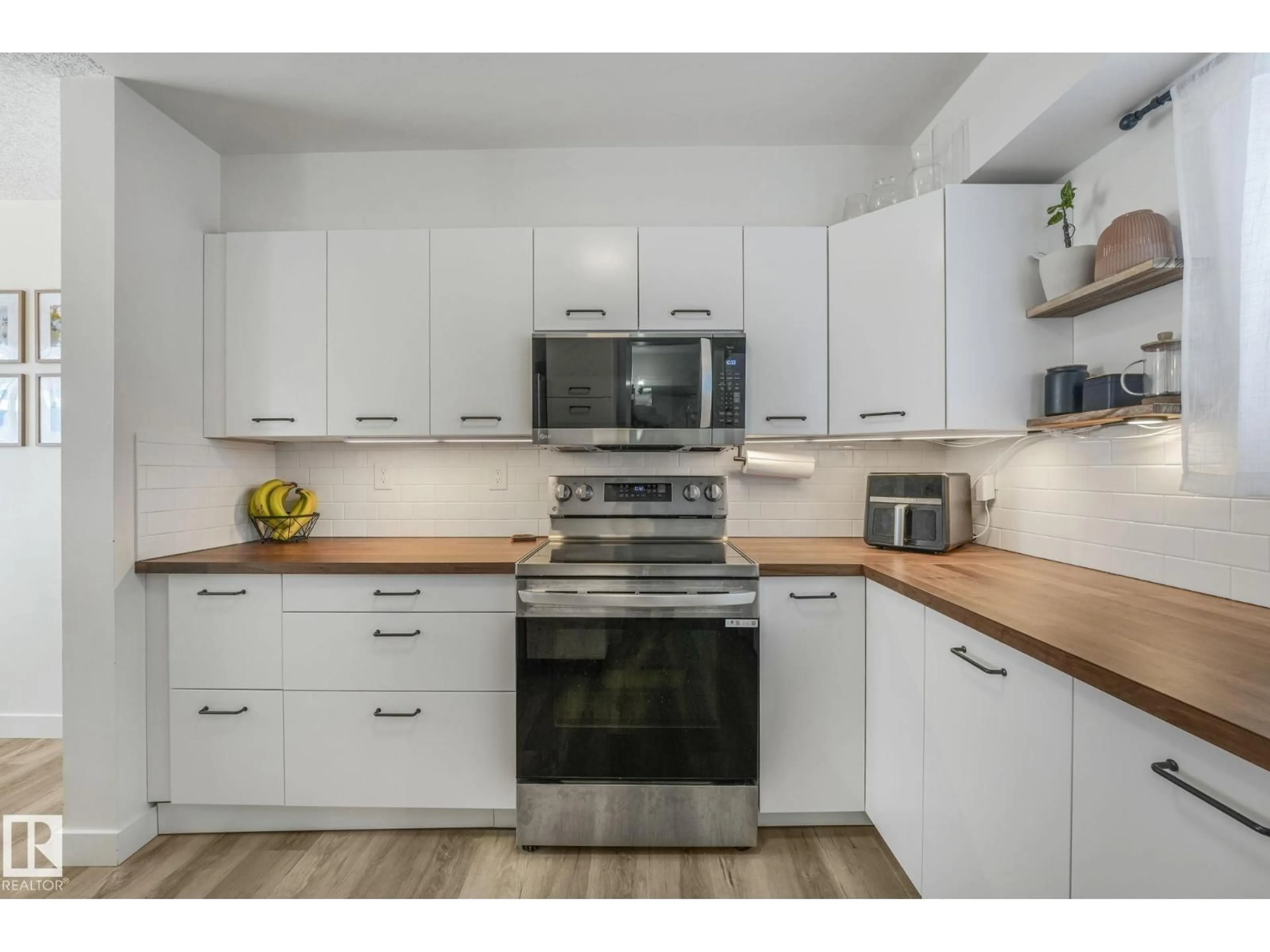 Standard kitchen, wood/laminate floor for #33 - 4403 RIVERBEND RD, Edmonton Alberta T6H5S9