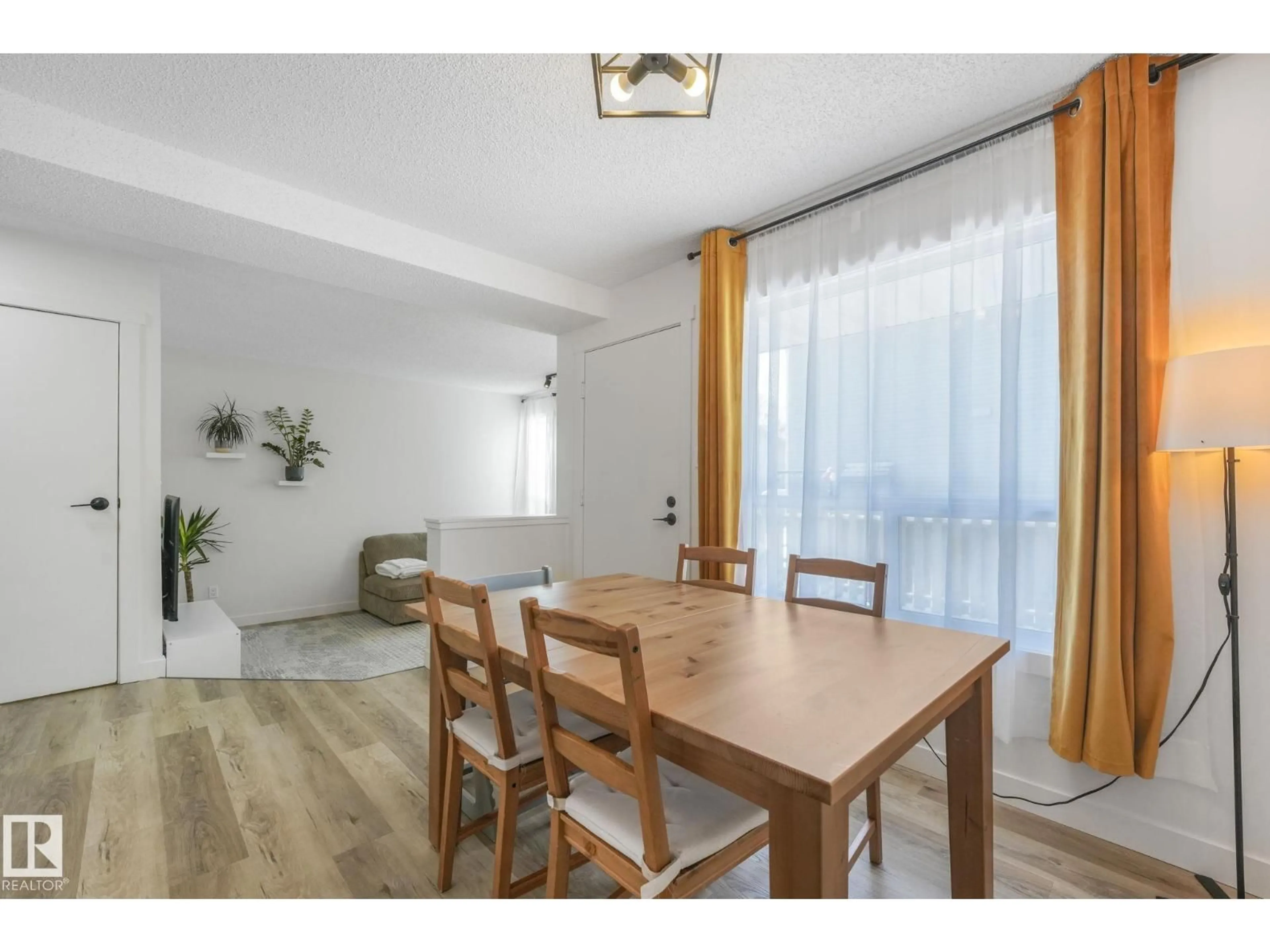 Dining room, wood/laminate floor for #33 - 4403 RIVERBEND RD, Edmonton Alberta T6H5S9