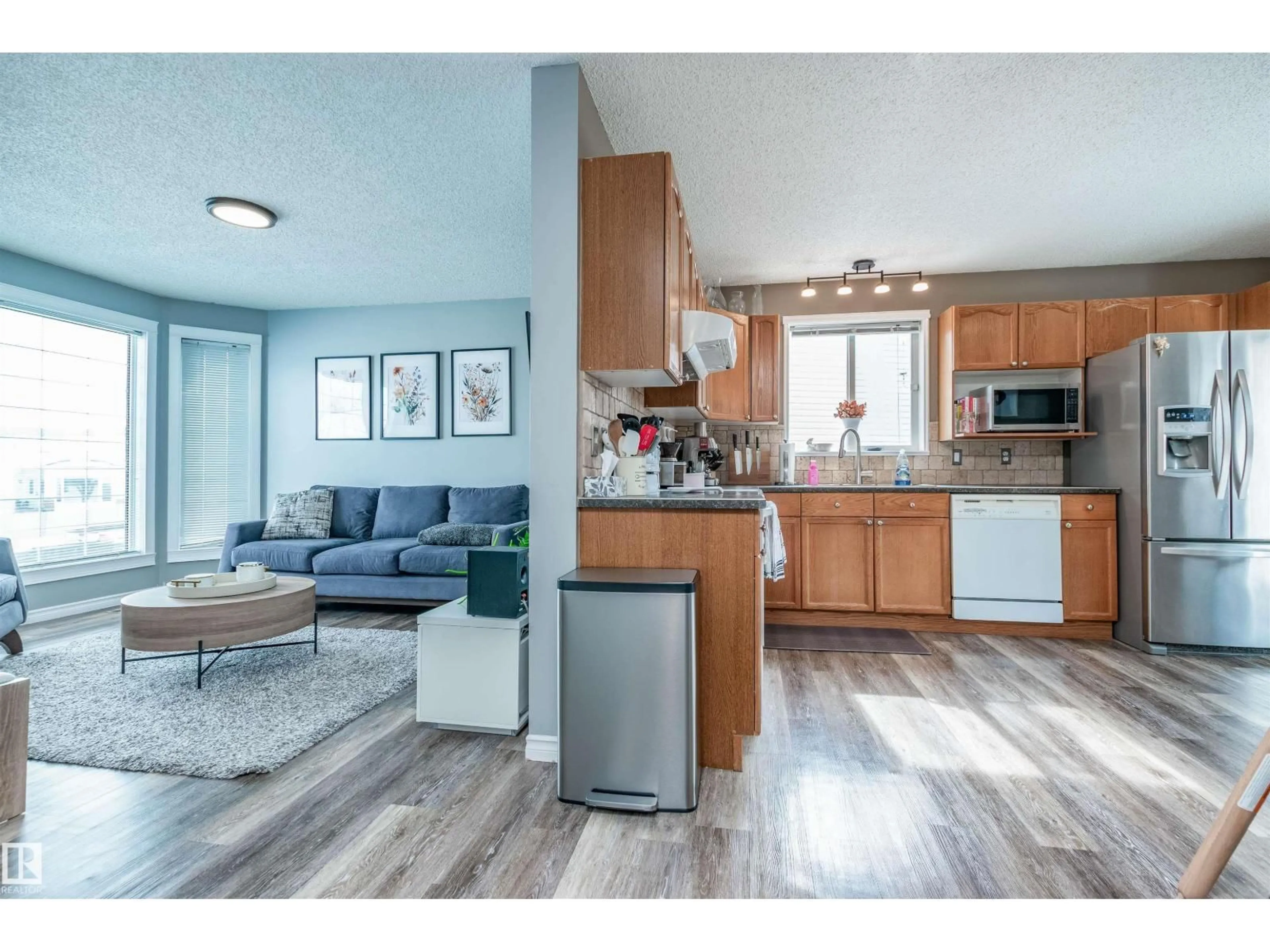 Open concept kitchen, wood/laminate floor for 47 DAWSON DR, Sherwood Park Alberta T8H1T7