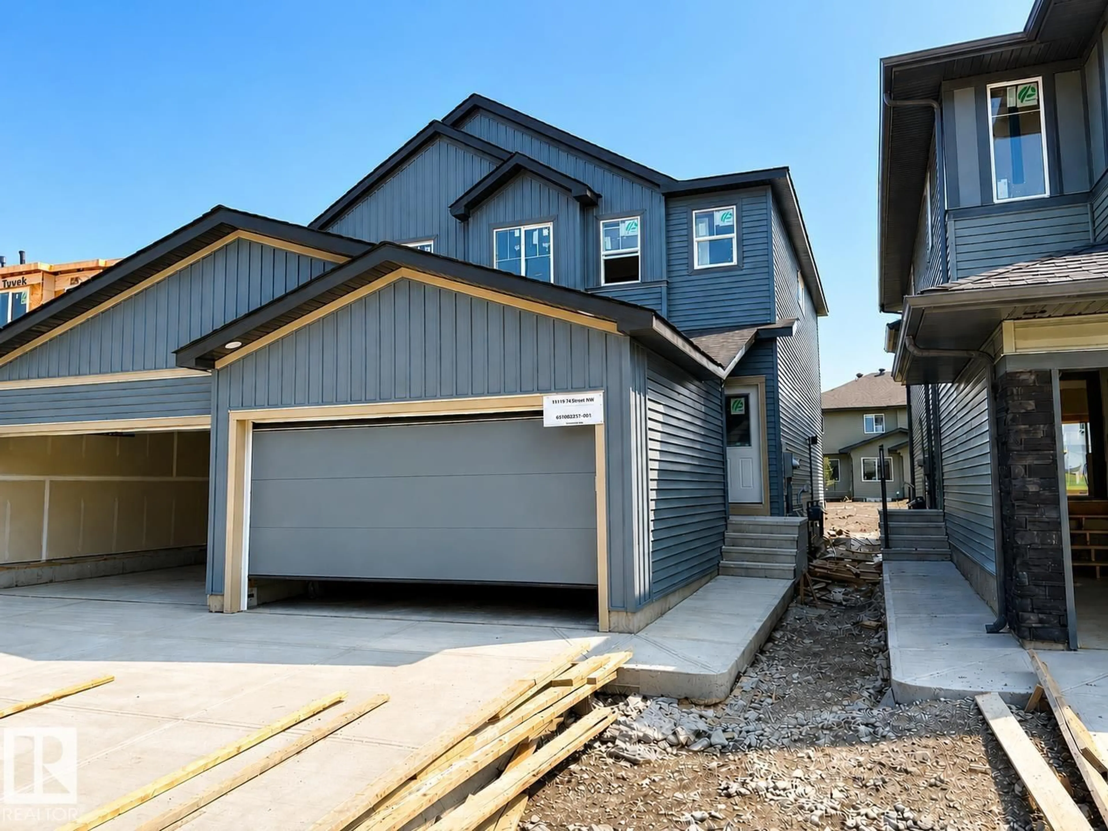 Home with vinyl exterior material, street for 18119 74 ST, Edmonton Alberta T5Z0X7