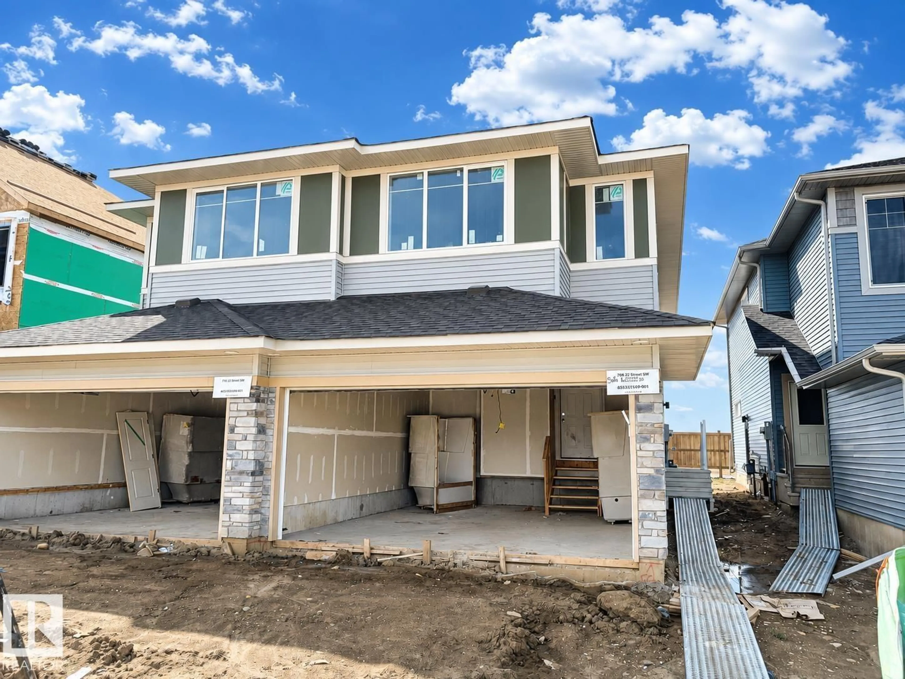 Home with vinyl exterior material, street for SW - 708 22 ST, Edmonton Alberta T6T0G9