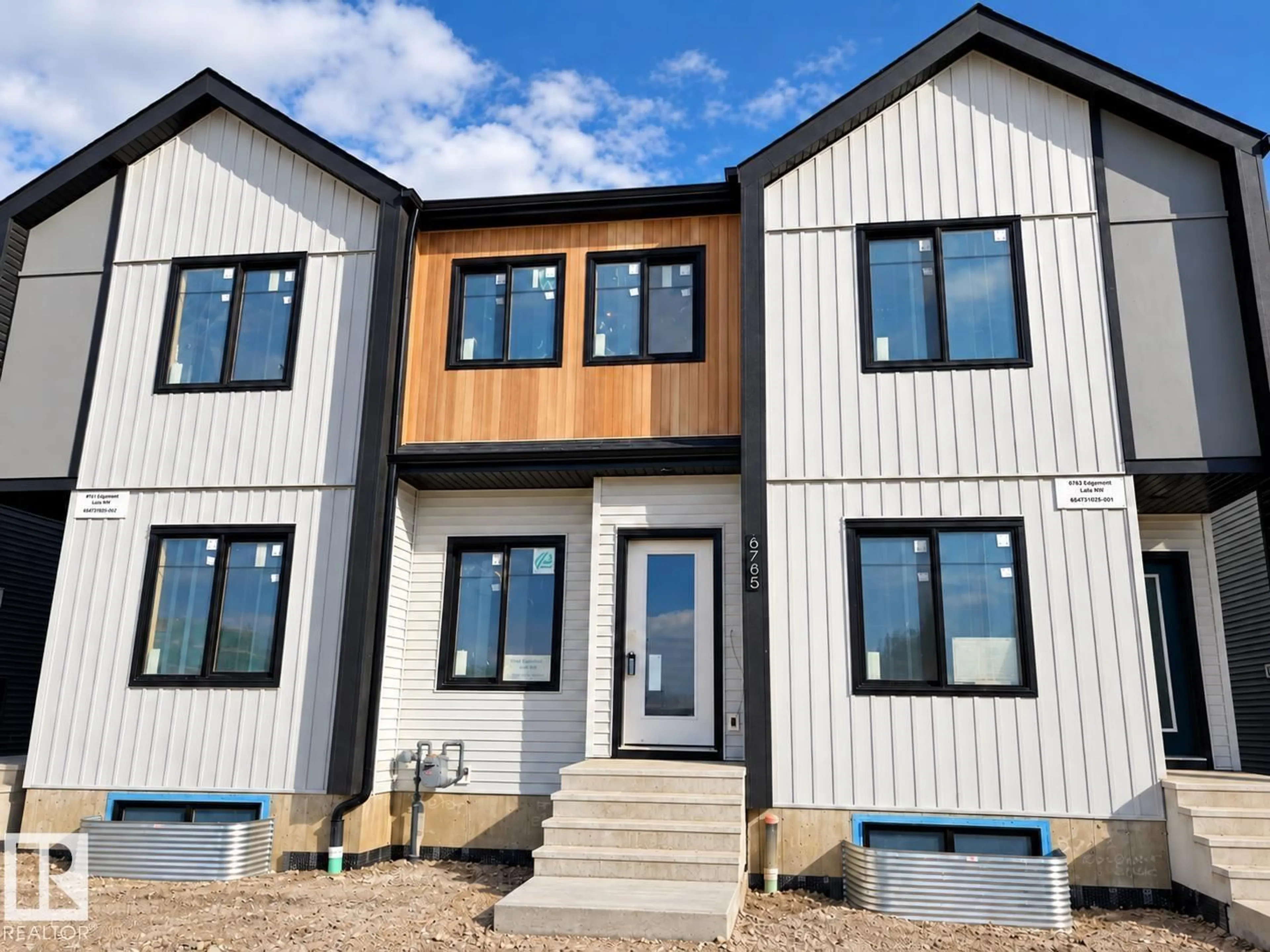 Home with vinyl exterior material, building for 8785 EDGEMONT LI NW, Edmonton Alberta T6M3K7