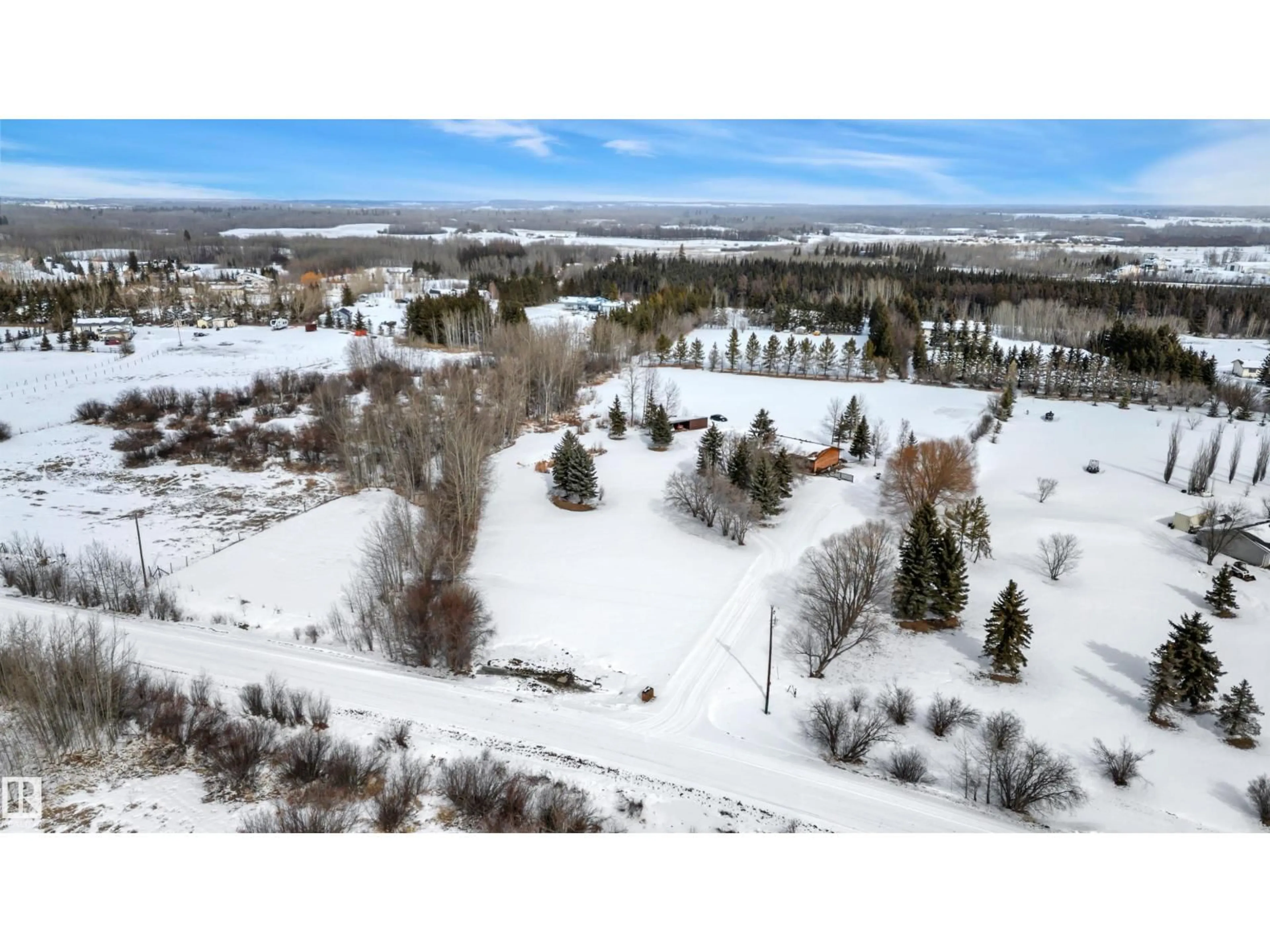 A pic from outside/outdoor area/front of a property/back of a property/a pic from drone, forest/trees view for 50 52442 RGE ROAD 220, Rural Strathcona County Alberta T8E2H7