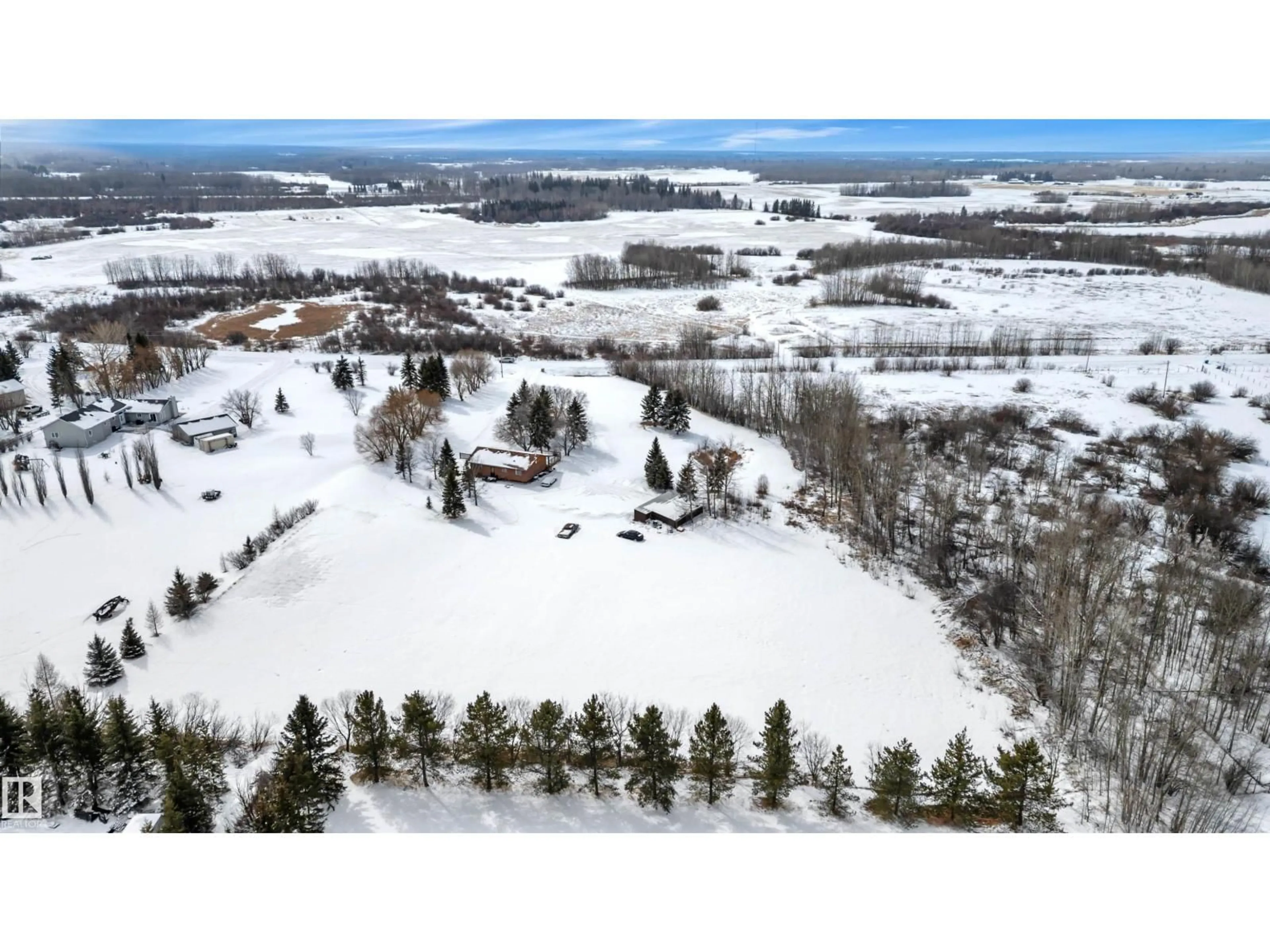 A pic from outside/outdoor area/front of a property/back of a property/a pic from drone, mountain view for 50 52442 RGE ROAD 220, Rural Strathcona County Alberta T8E2H7