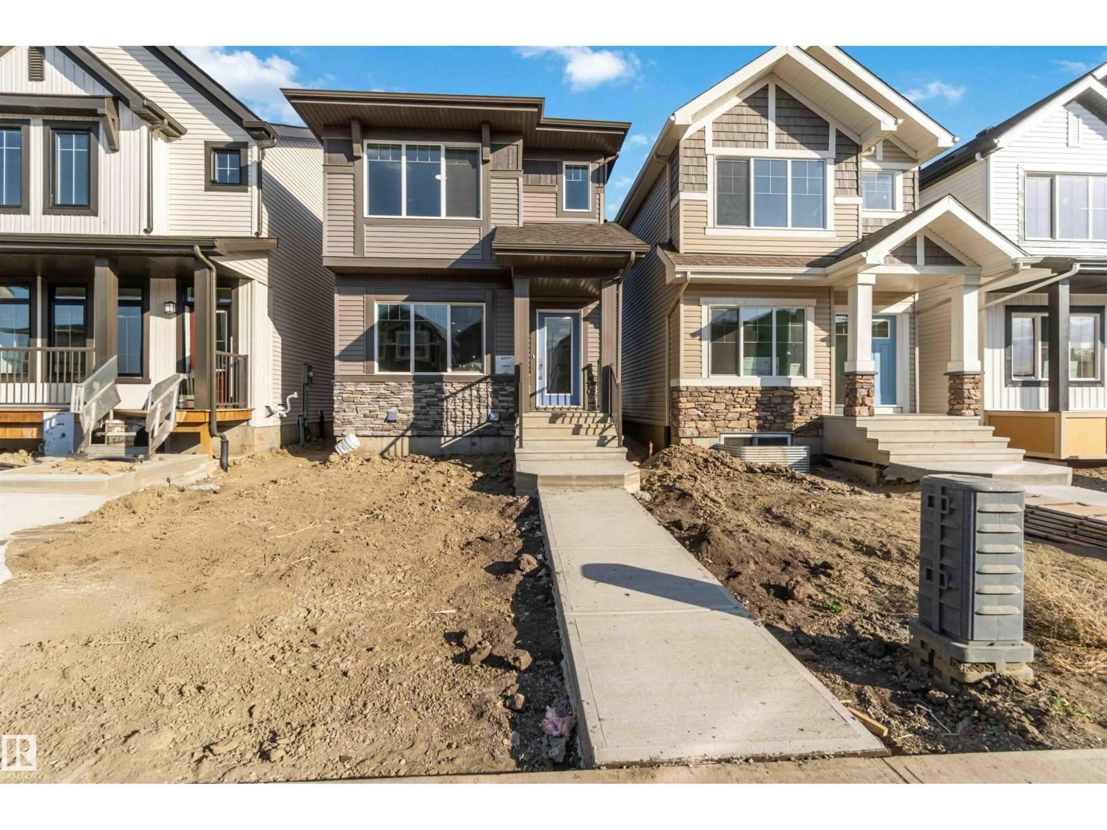 Home with brick exterior material, street for 18940 28 AV, Edmonton Alberta T6M3H2