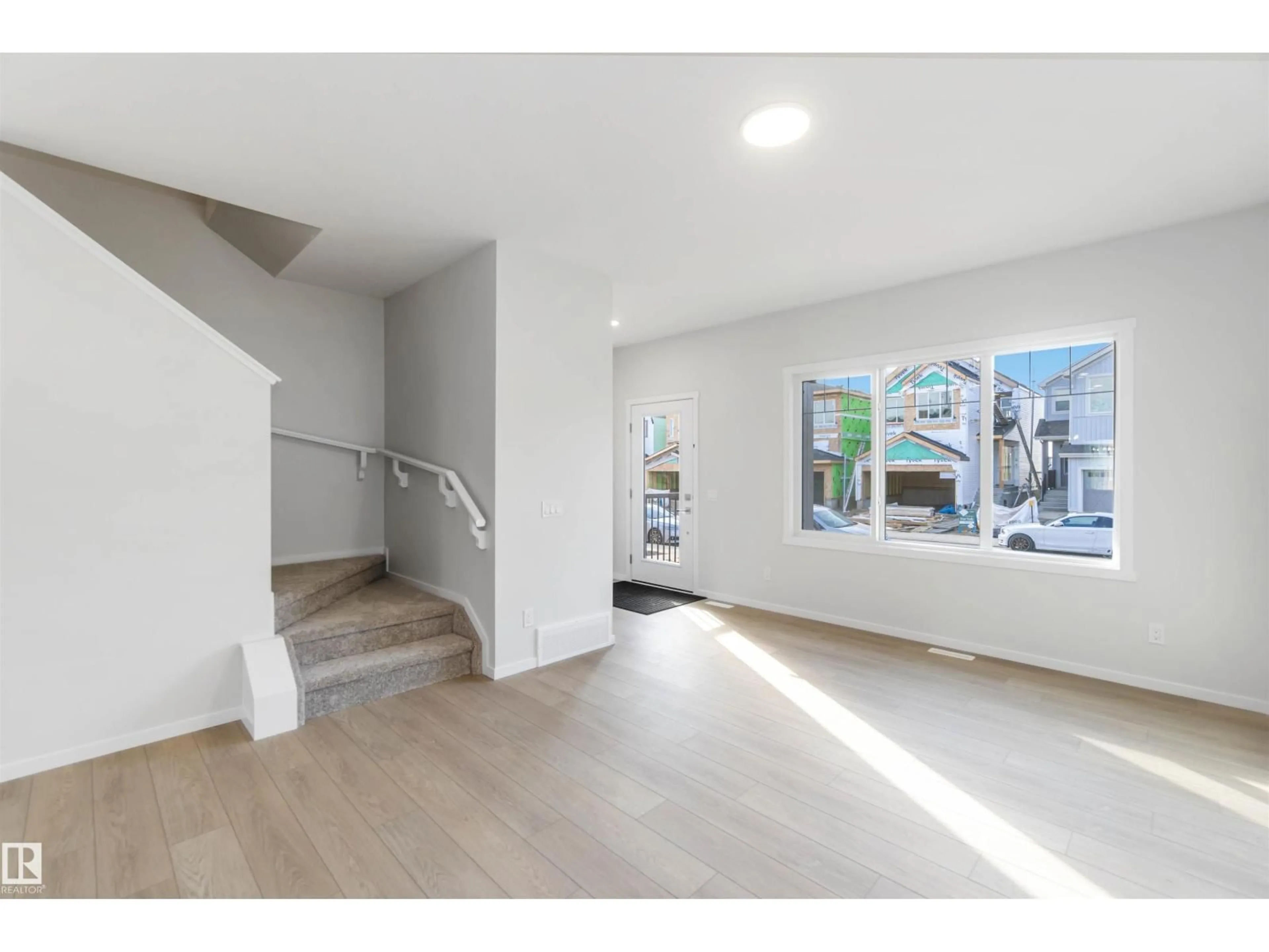 Indoor foyer for 18940 28 AV, Edmonton Alberta T6M3H2