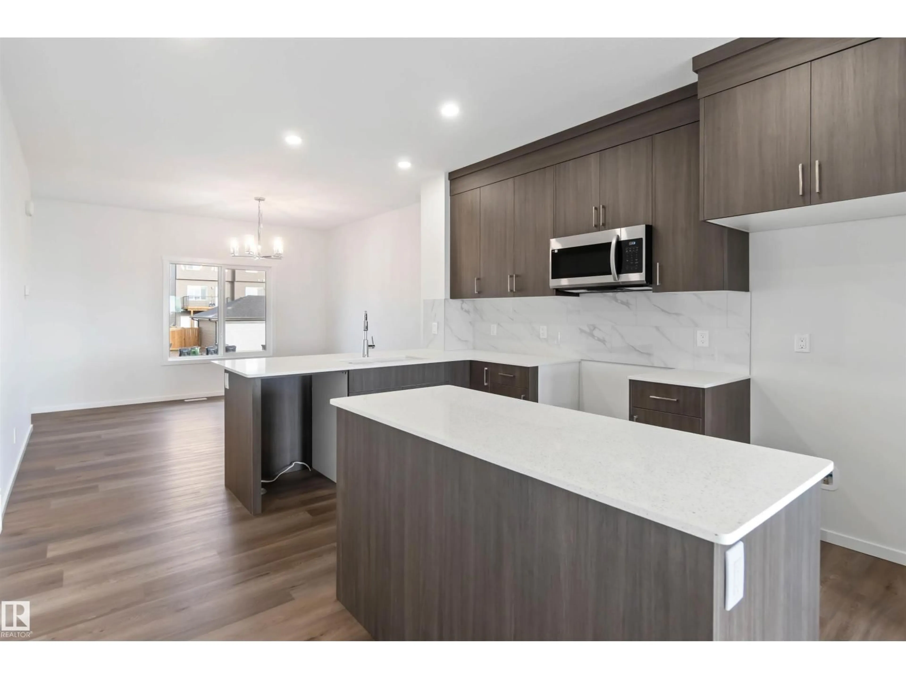Open concept kitchen, unknown for SW - 5452 HAWTHORN RU, Edmonton Alberta T6X3K6