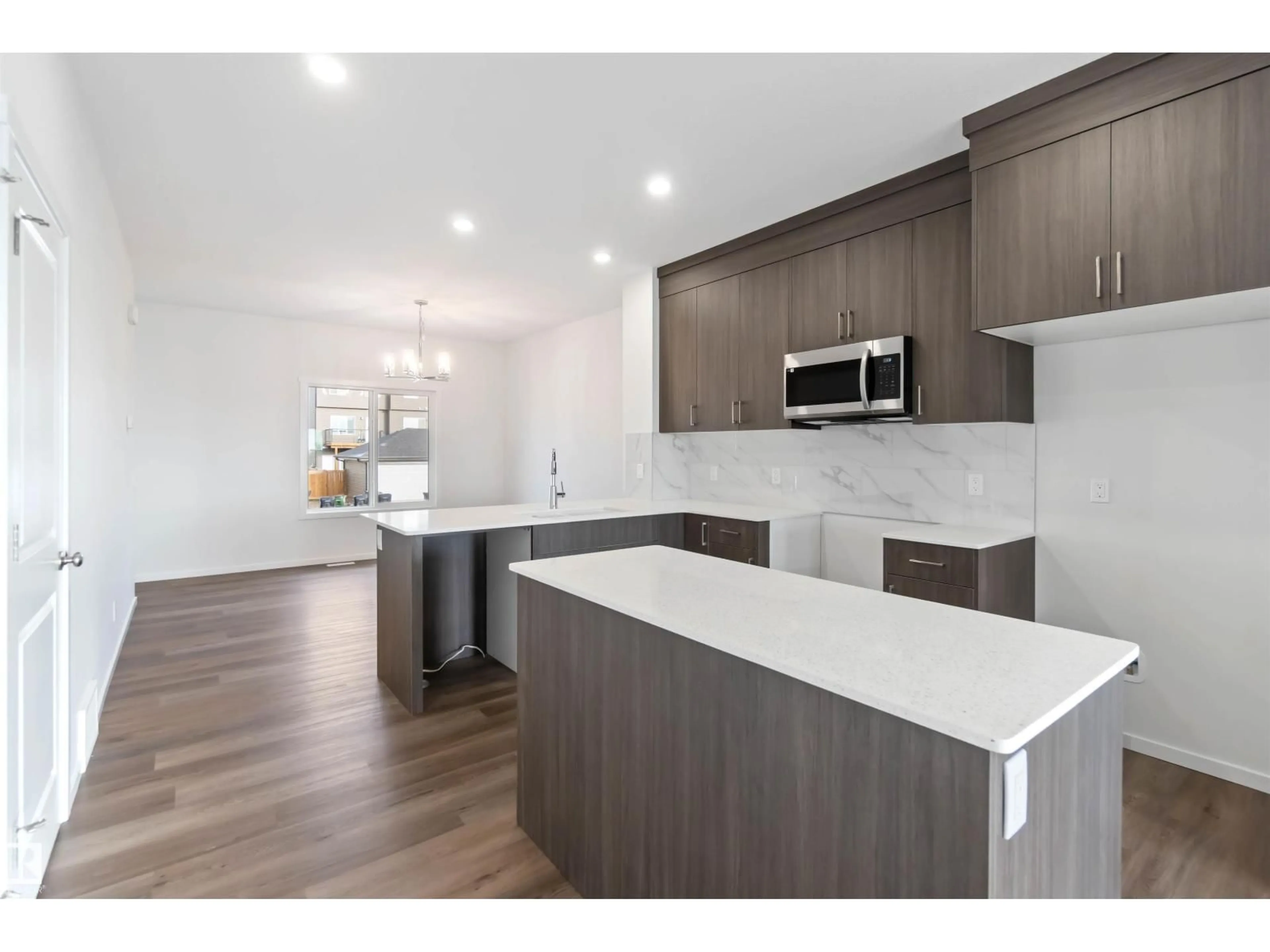 Open concept kitchen, unknown for SW - 5452 HAWTHORN RU, Edmonton Alberta T6X3K6