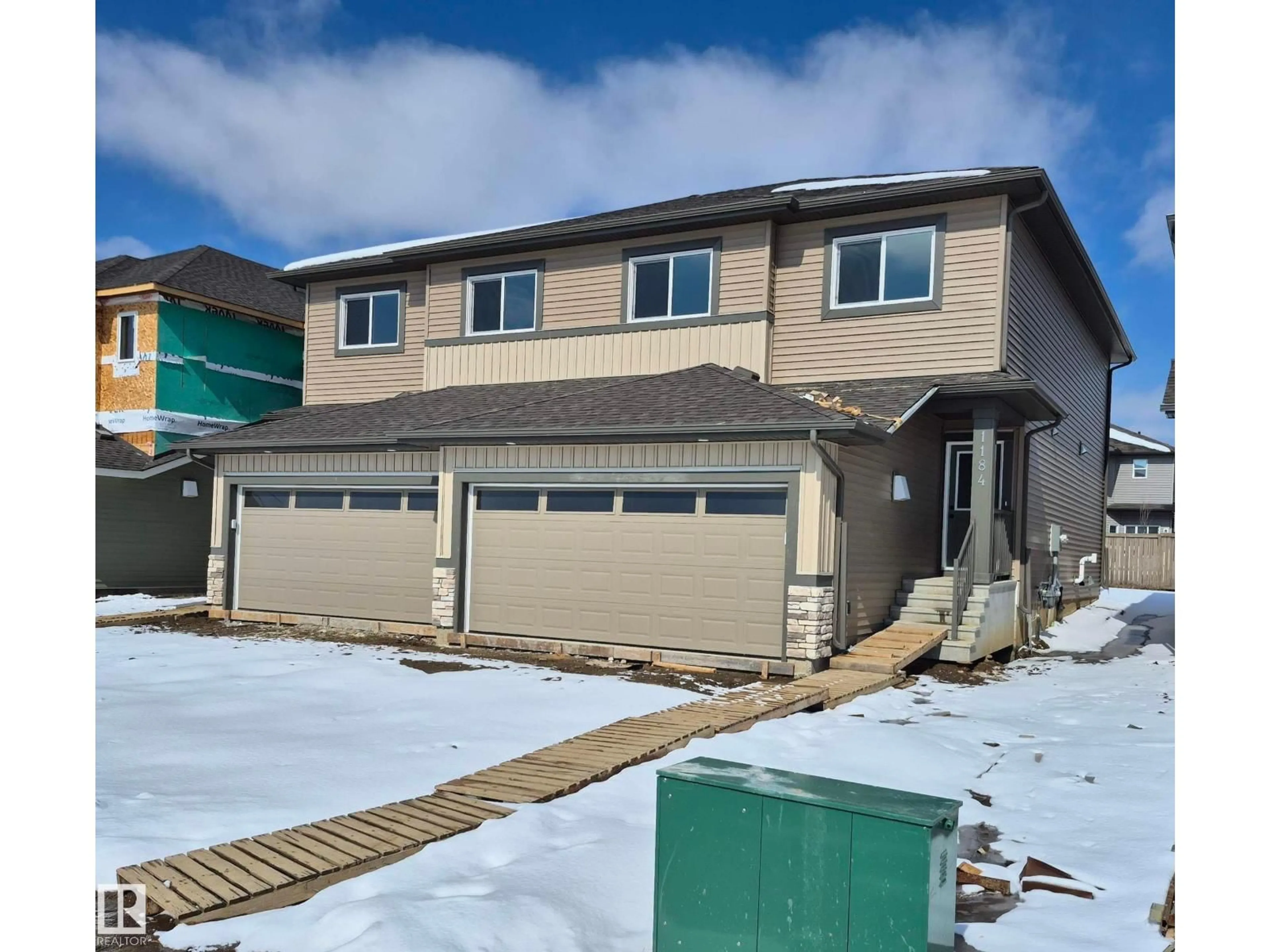 Home with vinyl exterior material, street for 1184 SOUTH CREEK WD, Stony Plain Alberta T7Z0P5