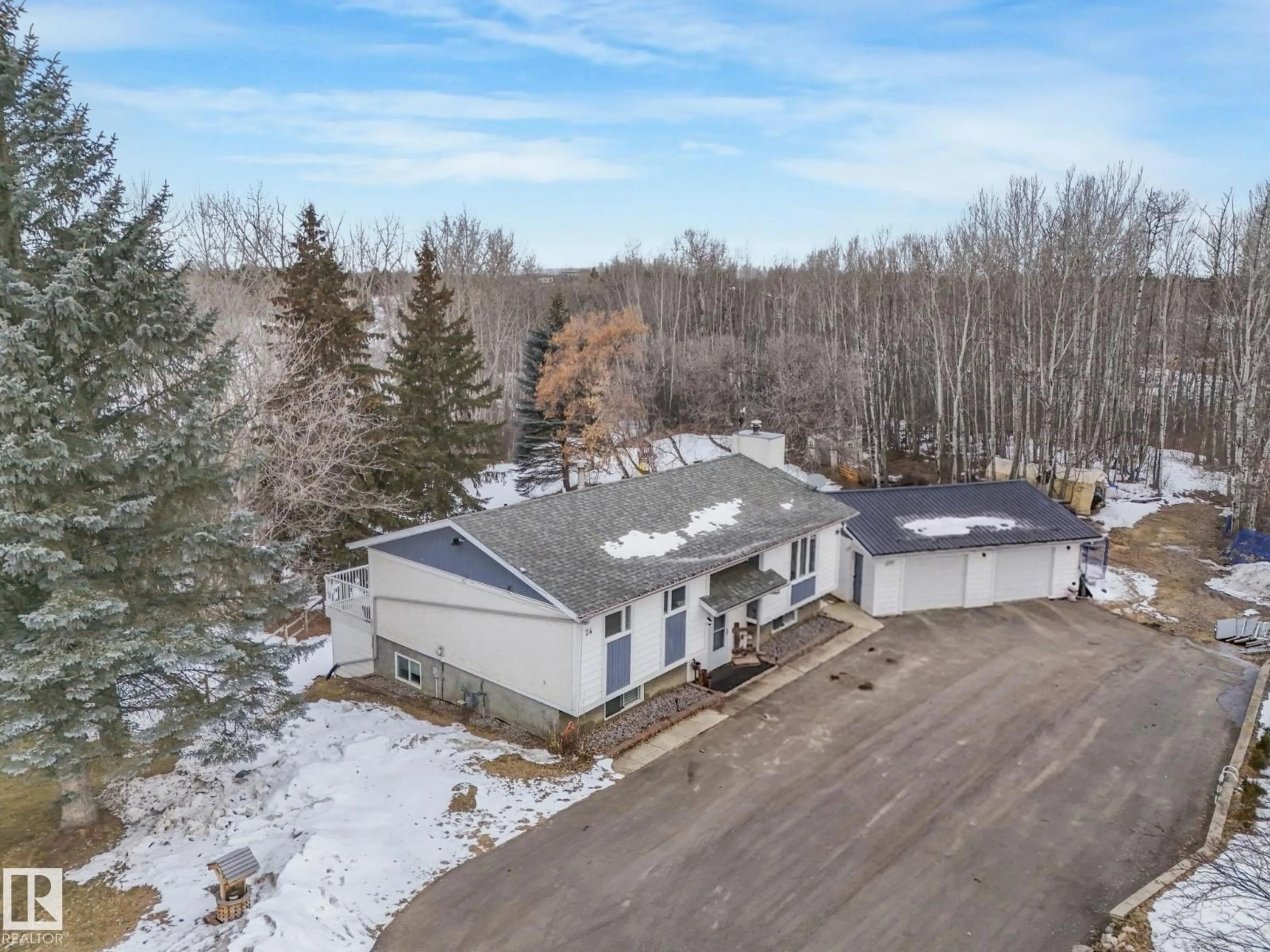 A pic from outside/outdoor area/front of a property/back of a property/a pic from drone, street for #24 - 2022 PARKLAND DR, Rural Parkland County Alberta T0E0H0