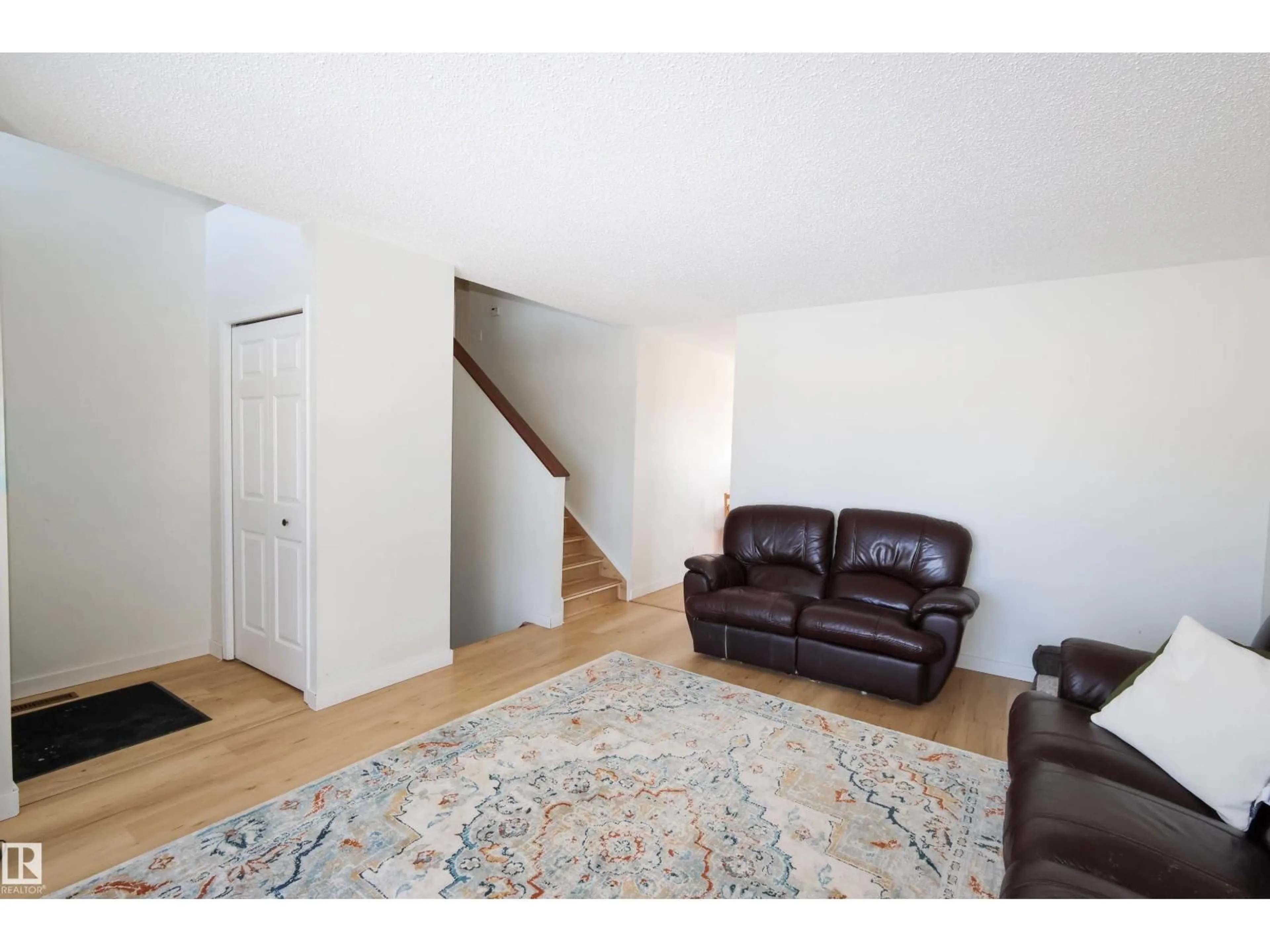 Living room with furniture, unknown for 8703 102 AV, Morinville Alberta T8R1B7