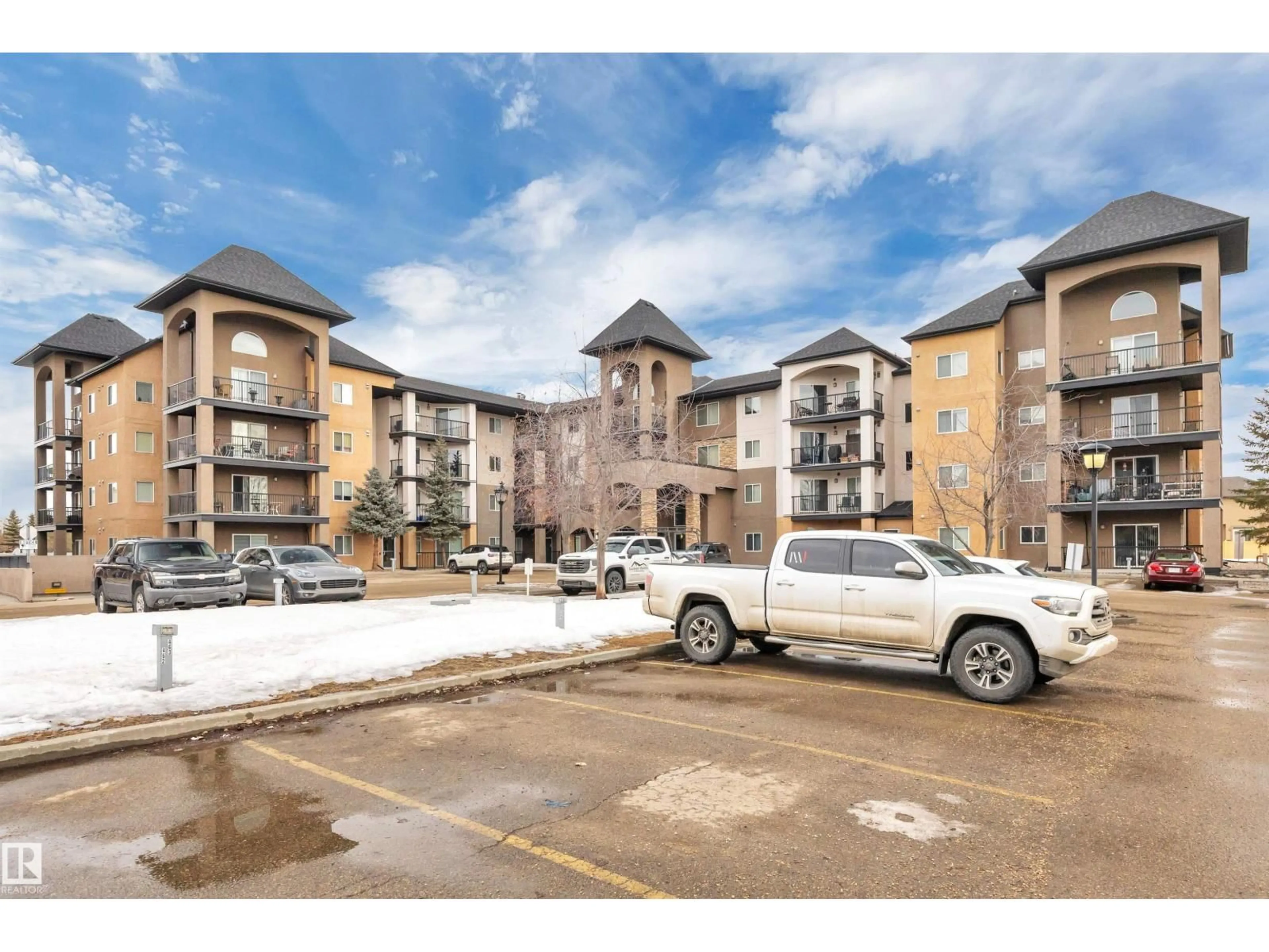 A pic from outside/outdoor area/front of a property/back of a property/a pic from drone, street for 313 14612 125 ST NW, Edmonton Alberta T5X0B6