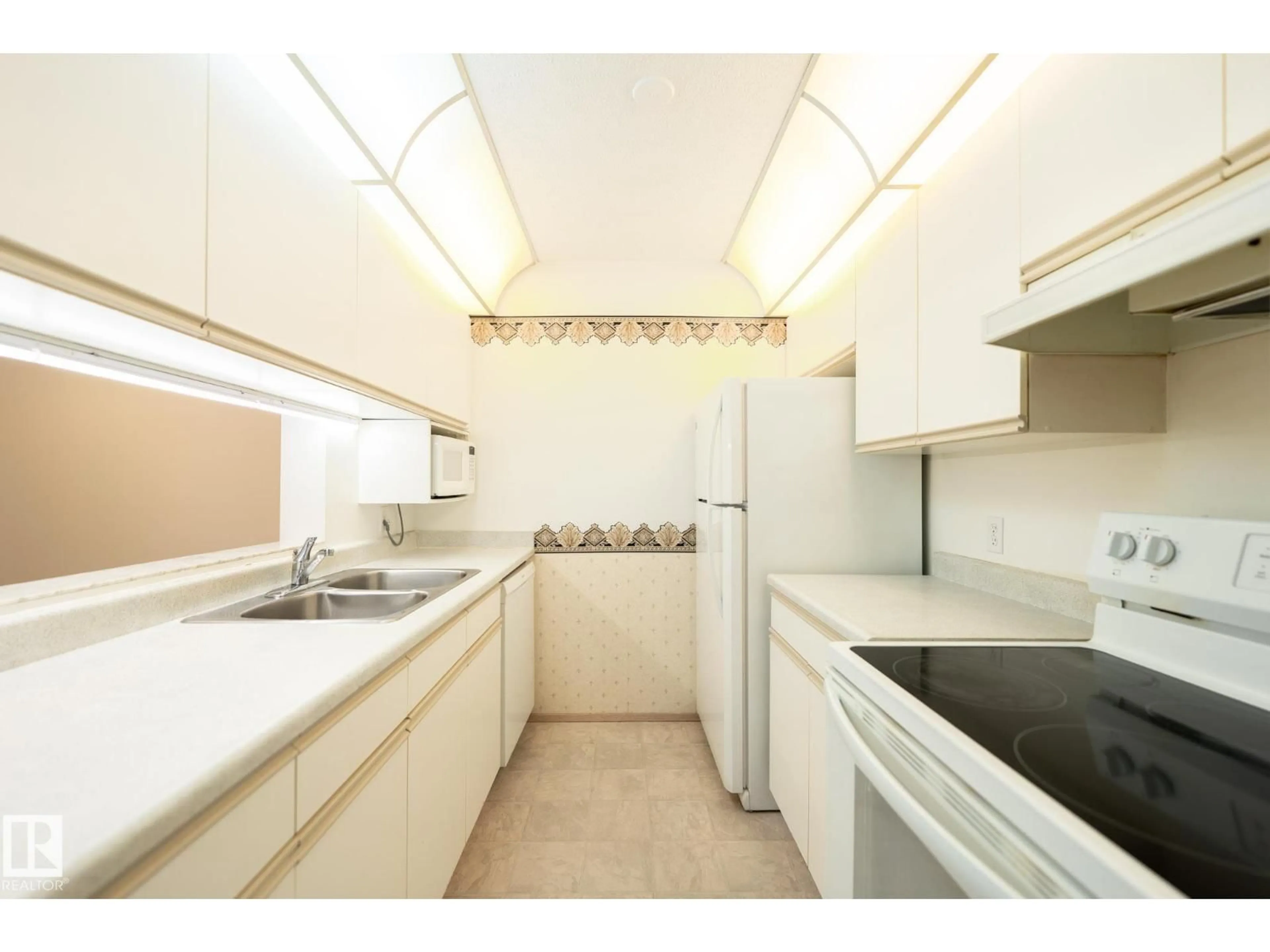 Standard kitchen, ceramic/tile floor for #102 - 6710 158 AV, Edmonton Alberta T5Z3A7