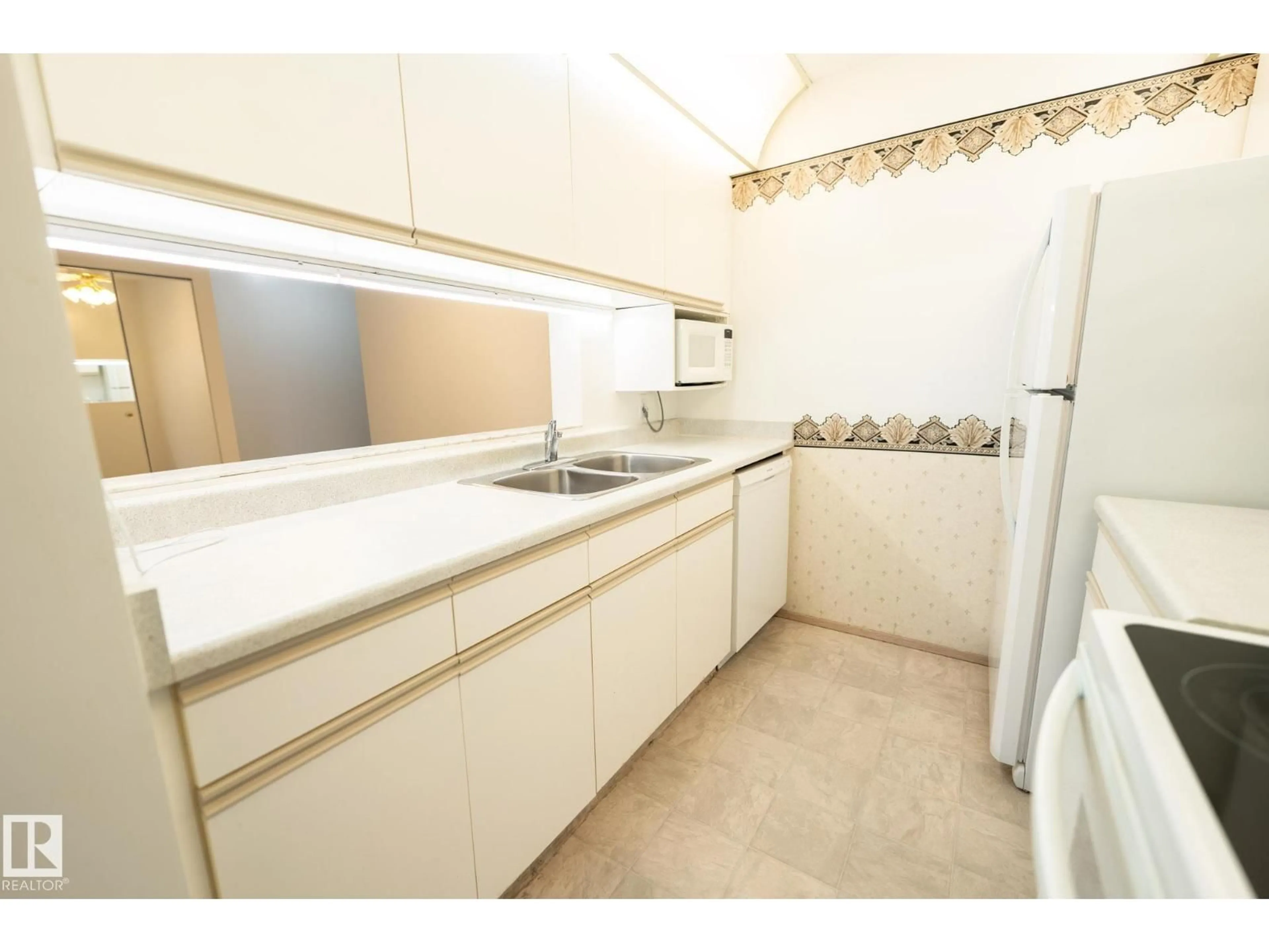 Standard kitchen, ceramic/tile floor for #102 - 6710 158 AV, Edmonton Alberta T5Z3A7