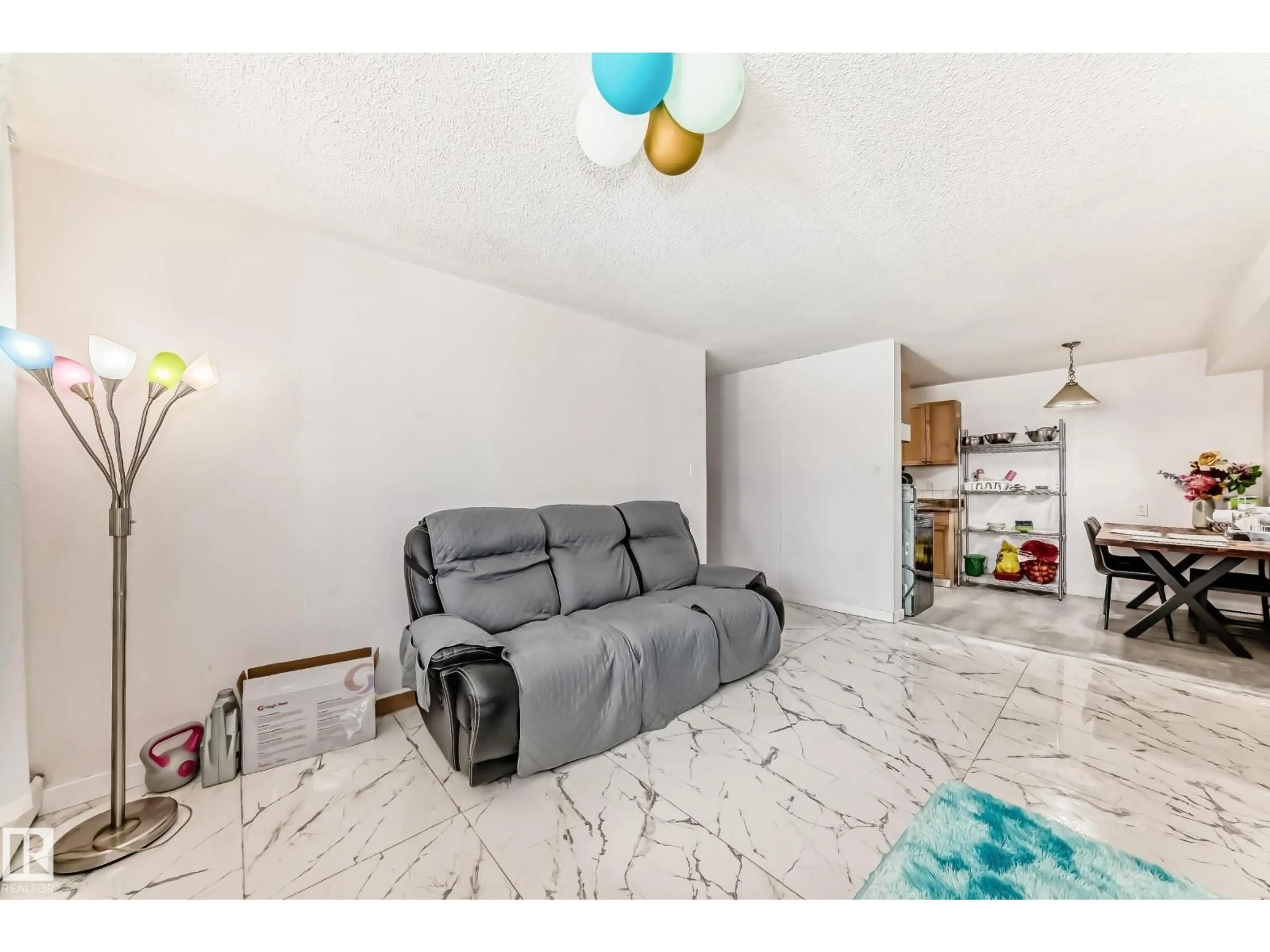 Living room with furniture, unknown for 5C - 5715 133 AV, Edmonton Alberta T5A0K3