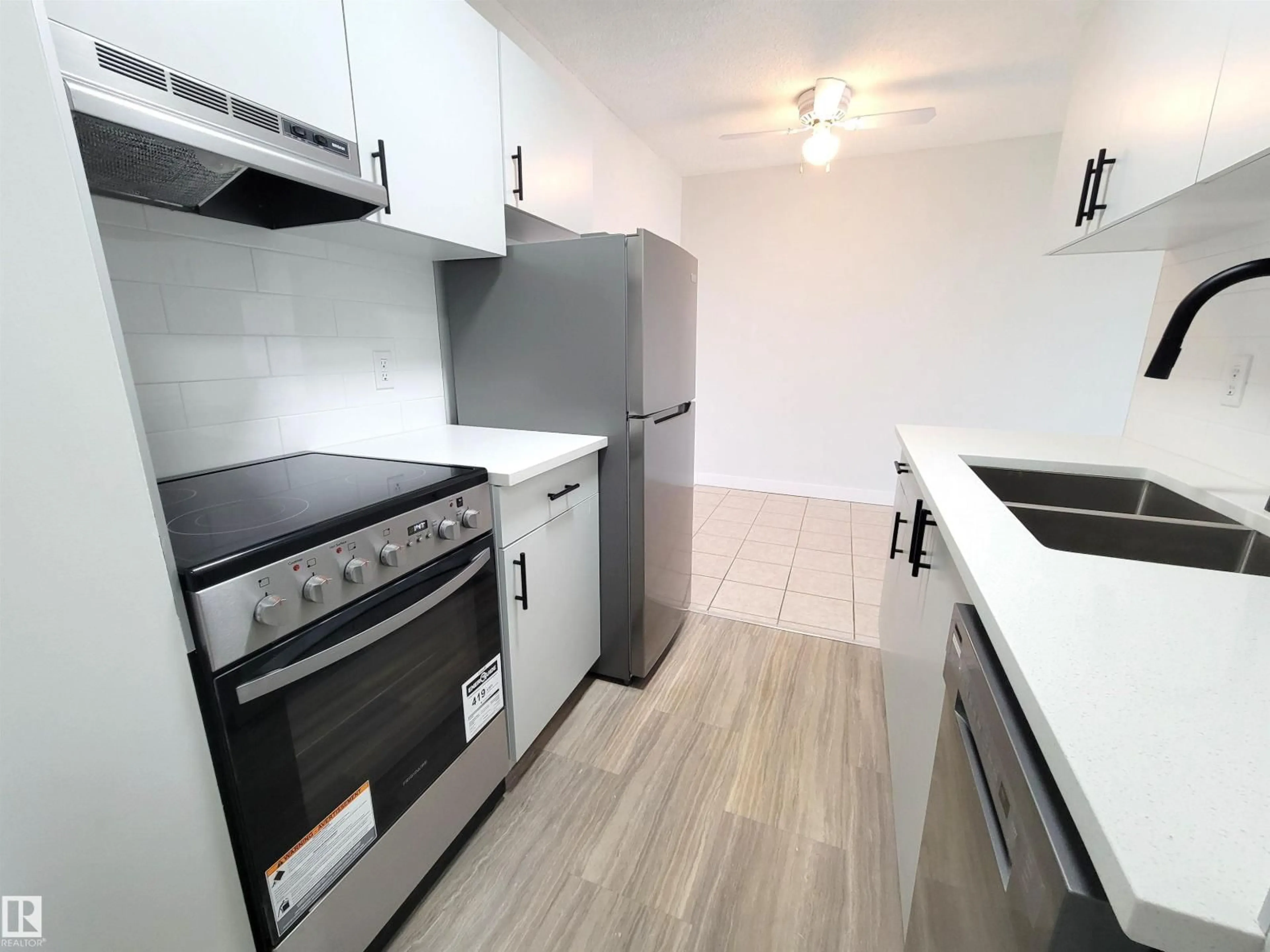 Standard kitchen, wood/laminate floor for #804 - 9028 JASPER AV, Edmonton Alberta T5H3Y6