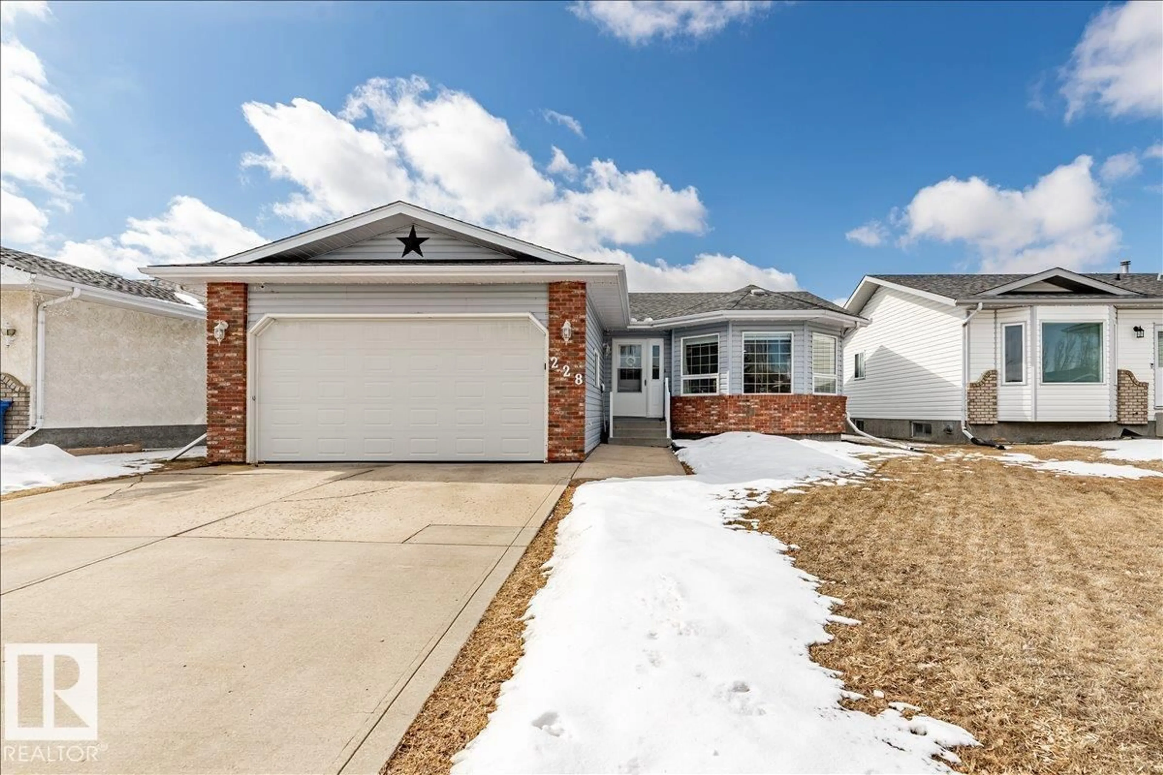 Home with brick exterior material, street for 228 PARKSIDE DR, Wetaskiwin Alberta T9A3J5
