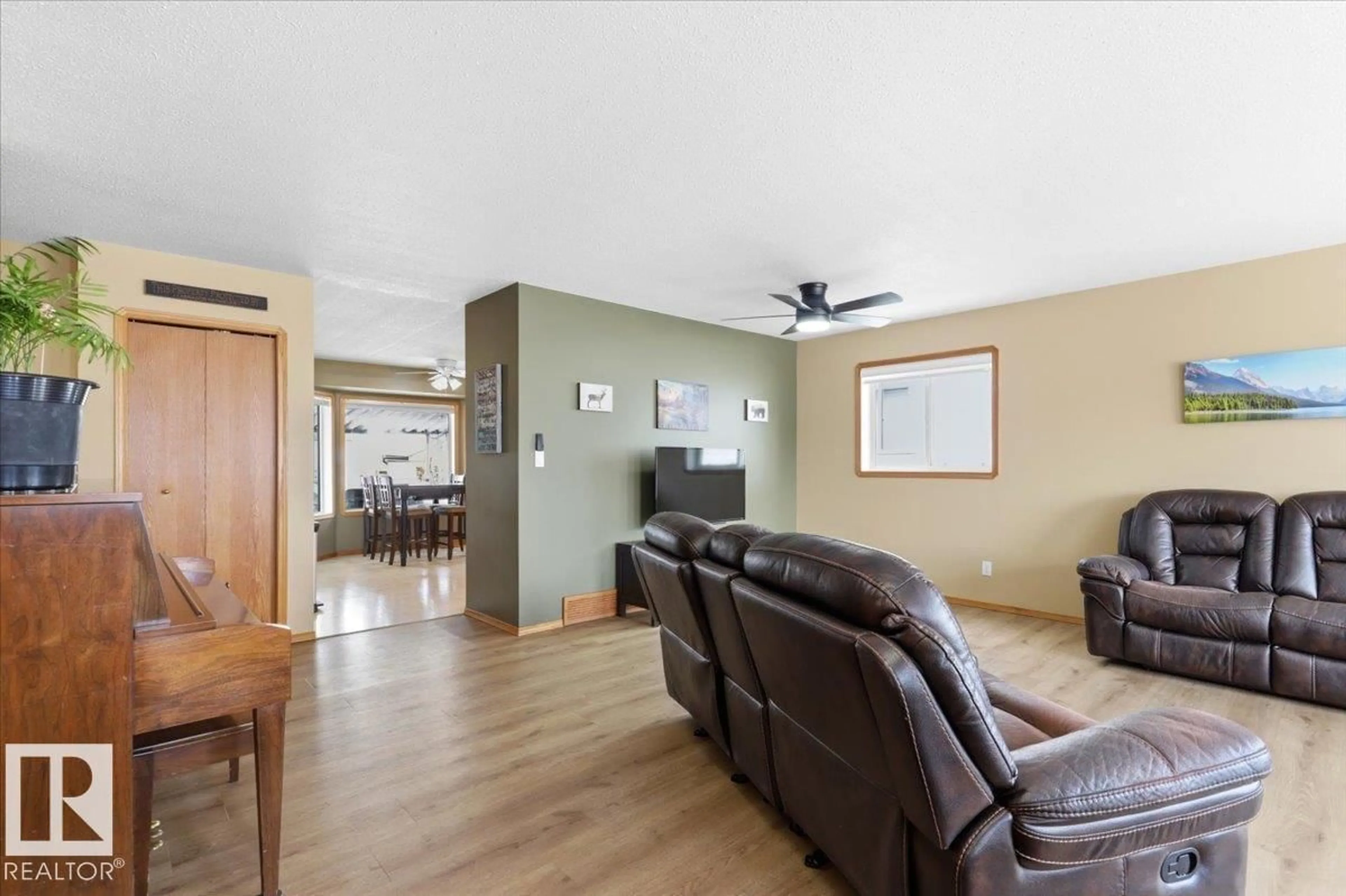 Living room with furniture, wood/laminate floor for 228 PARKSIDE DR, Wetaskiwin Alberta T9A3J5