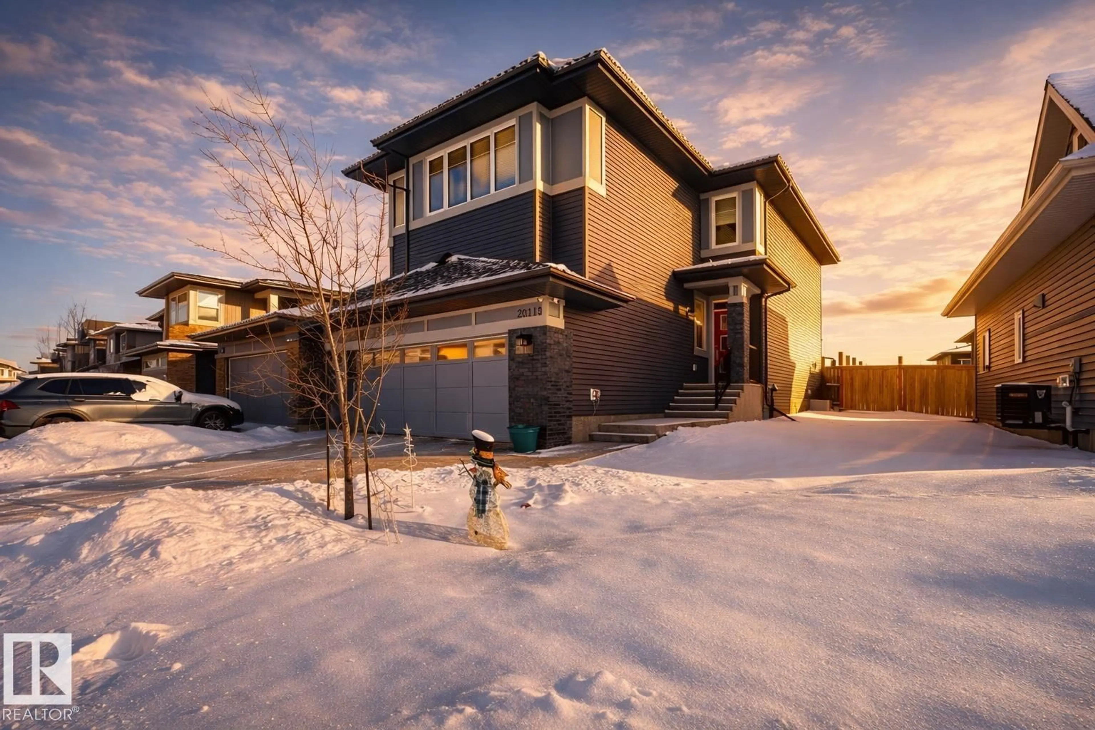 Home with brick exterior material, street for NW - 20119 29 AV, Edmonton Alberta T6M0W6