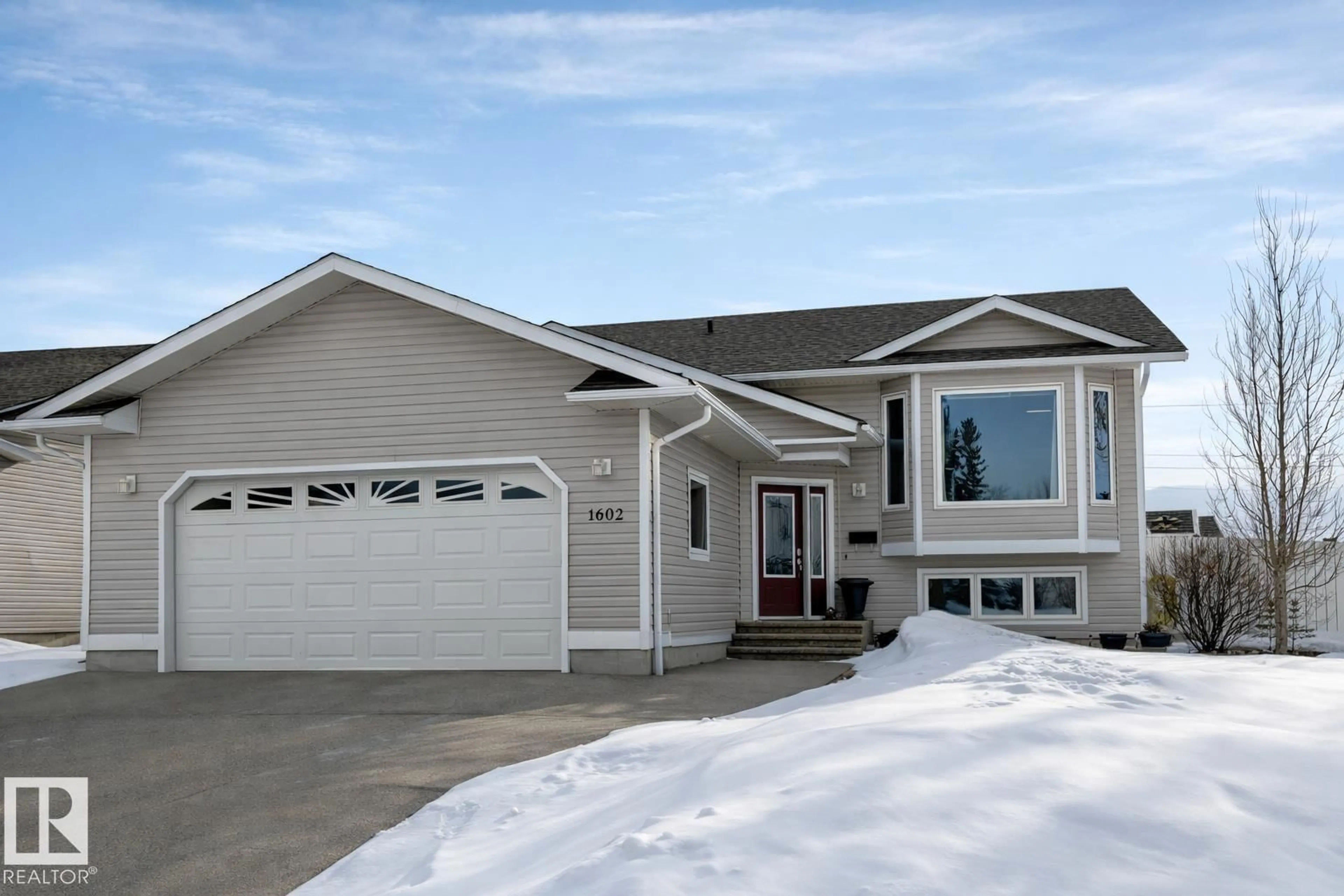 Home with vinyl exterior material, street for 1602 7 AV, Cold Lake Alberta T9M0B7