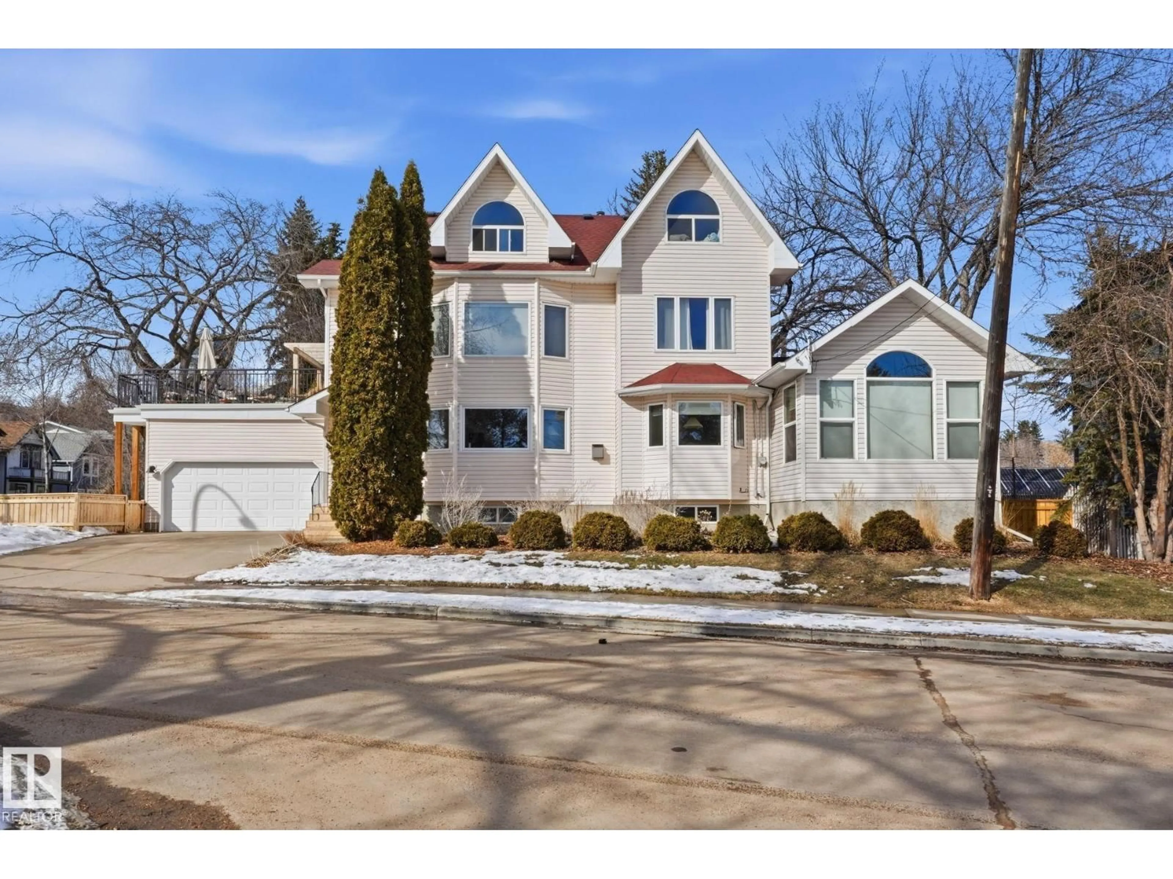 Home with brick exterior material, street for 9228 100 AV, Edmonton Alberta T5H0A3