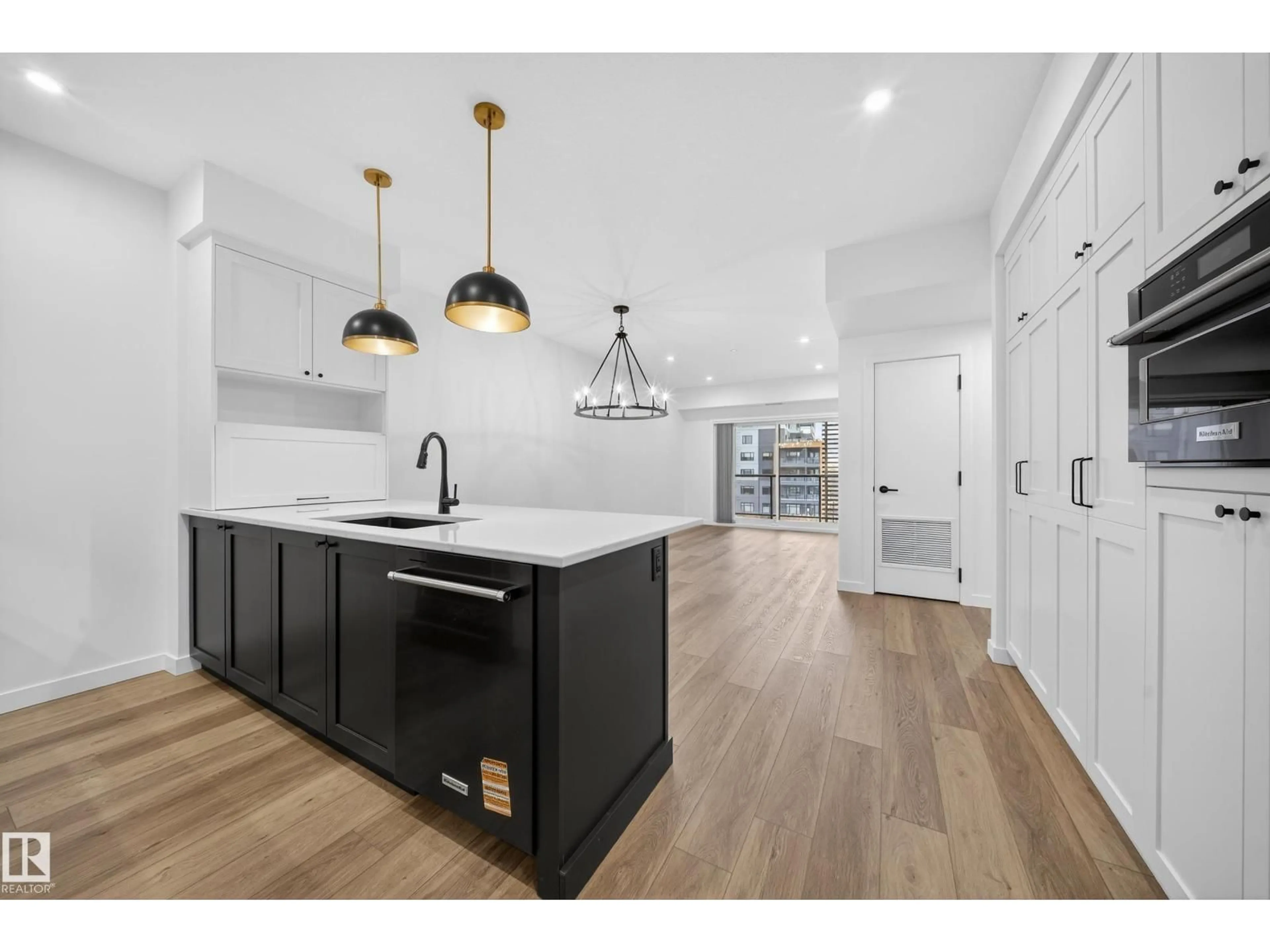 Open concept kitchen, unknown for #301 - 7459 MAY CM, Edmonton Alberta T6R0X6