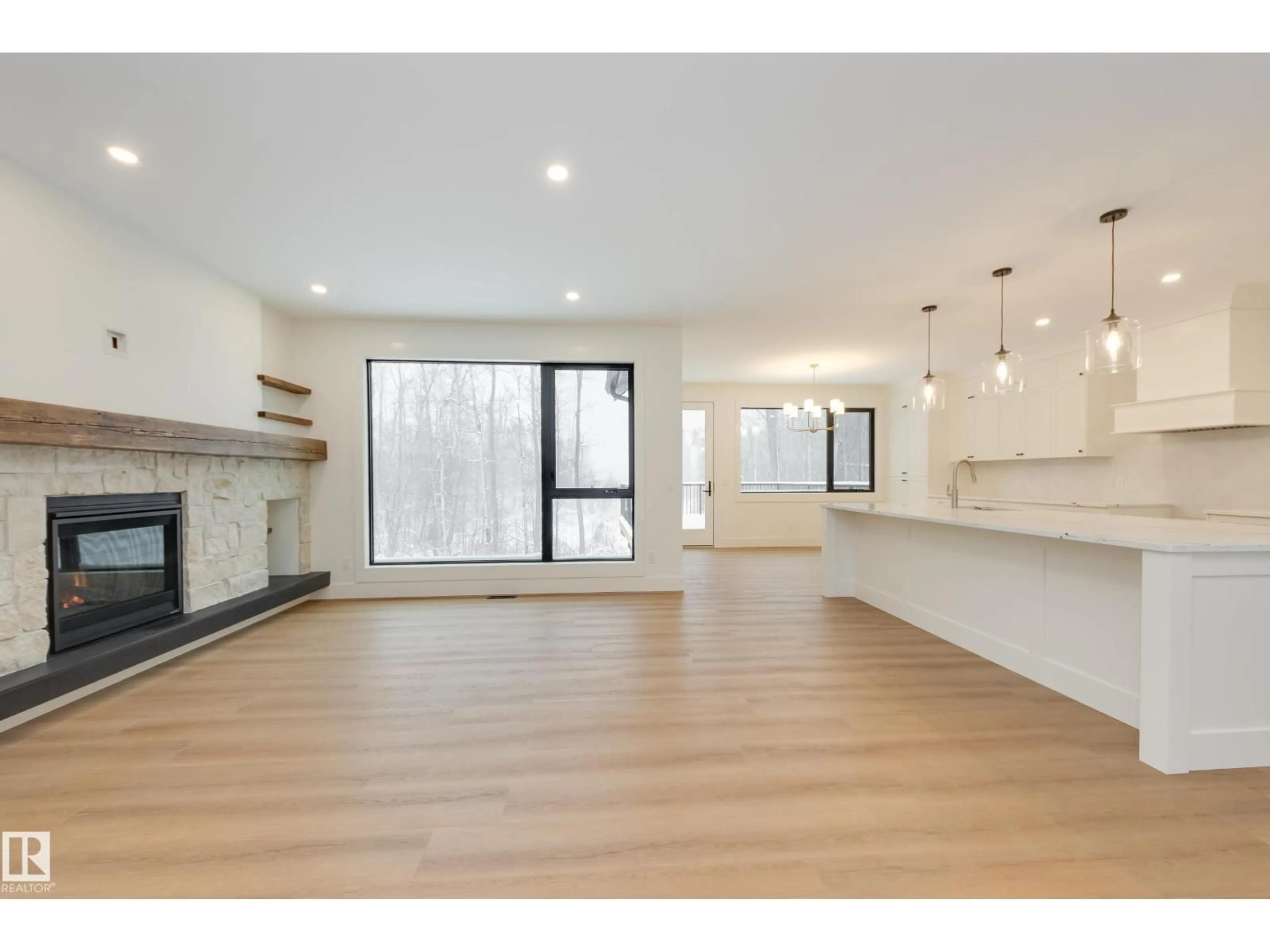 Open concept kitchen, wood/laminate floor for #6 - 54514 RGE ROAD 12, Rural Lac Ste. Anne County Alberta T0E1V2