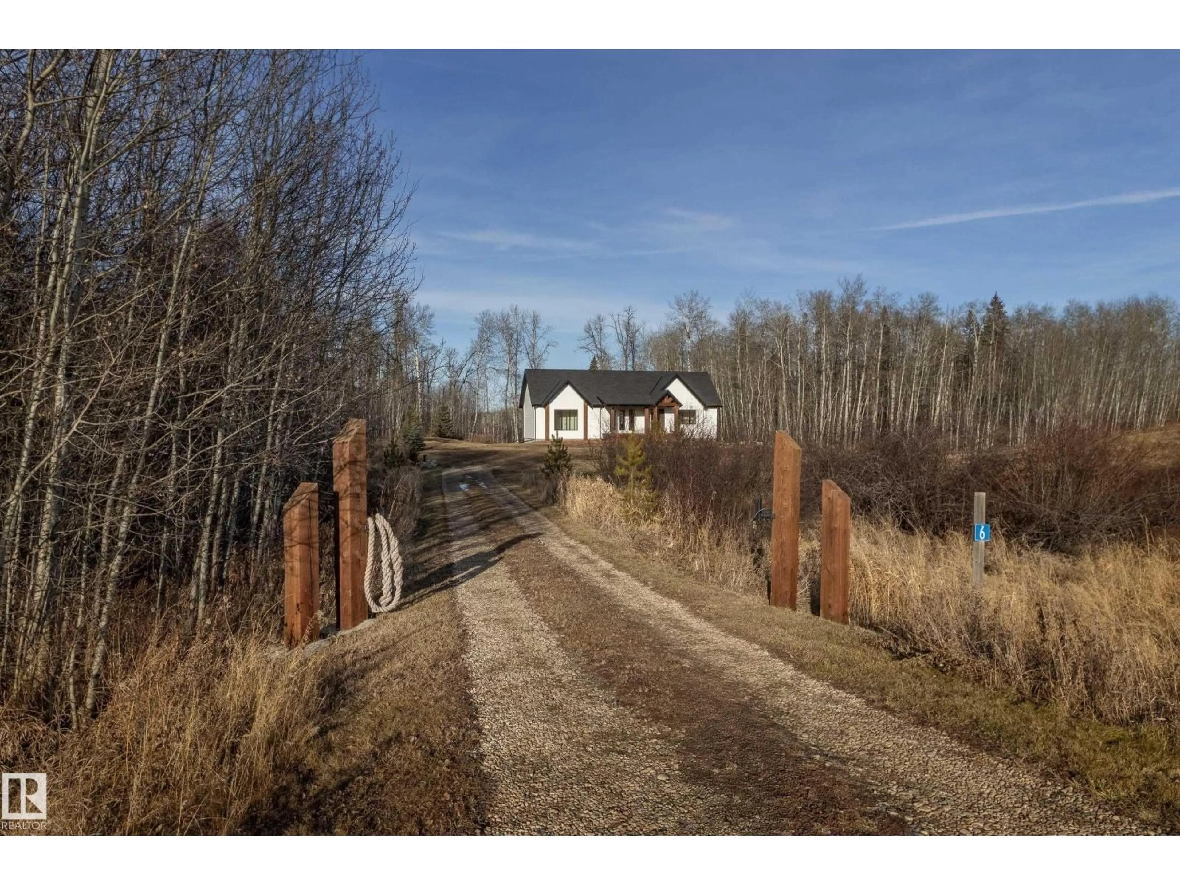 A pic from outside/outdoor area/front of a property/back of a property/a pic from drone, unknown for #6 - 54514 RGE ROAD 12, Rural Lac Ste. Anne County Alberta T0E1V2