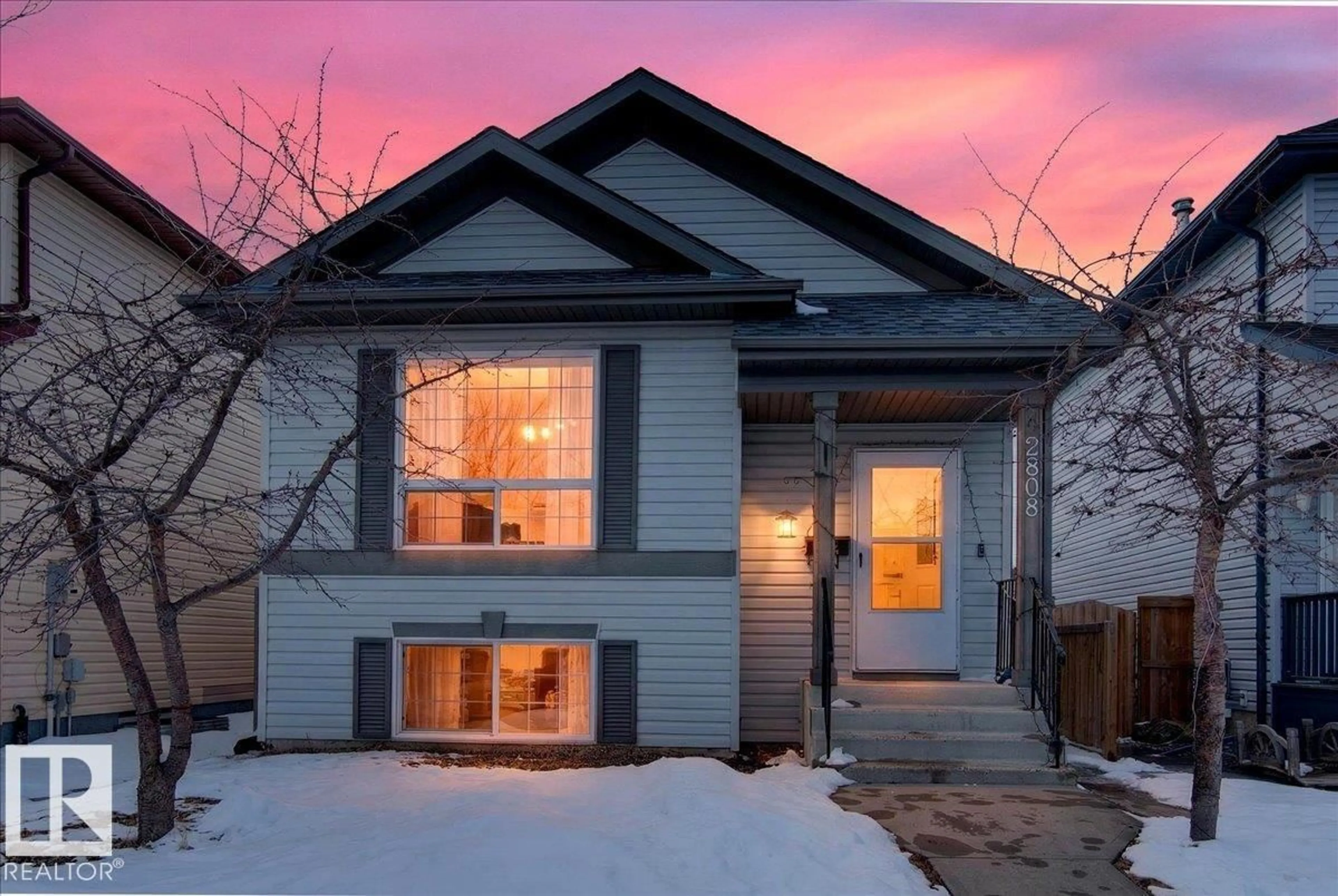 Home with vinyl exterior material, street for 2808 25 ST, Edmonton Alberta T6T2A3