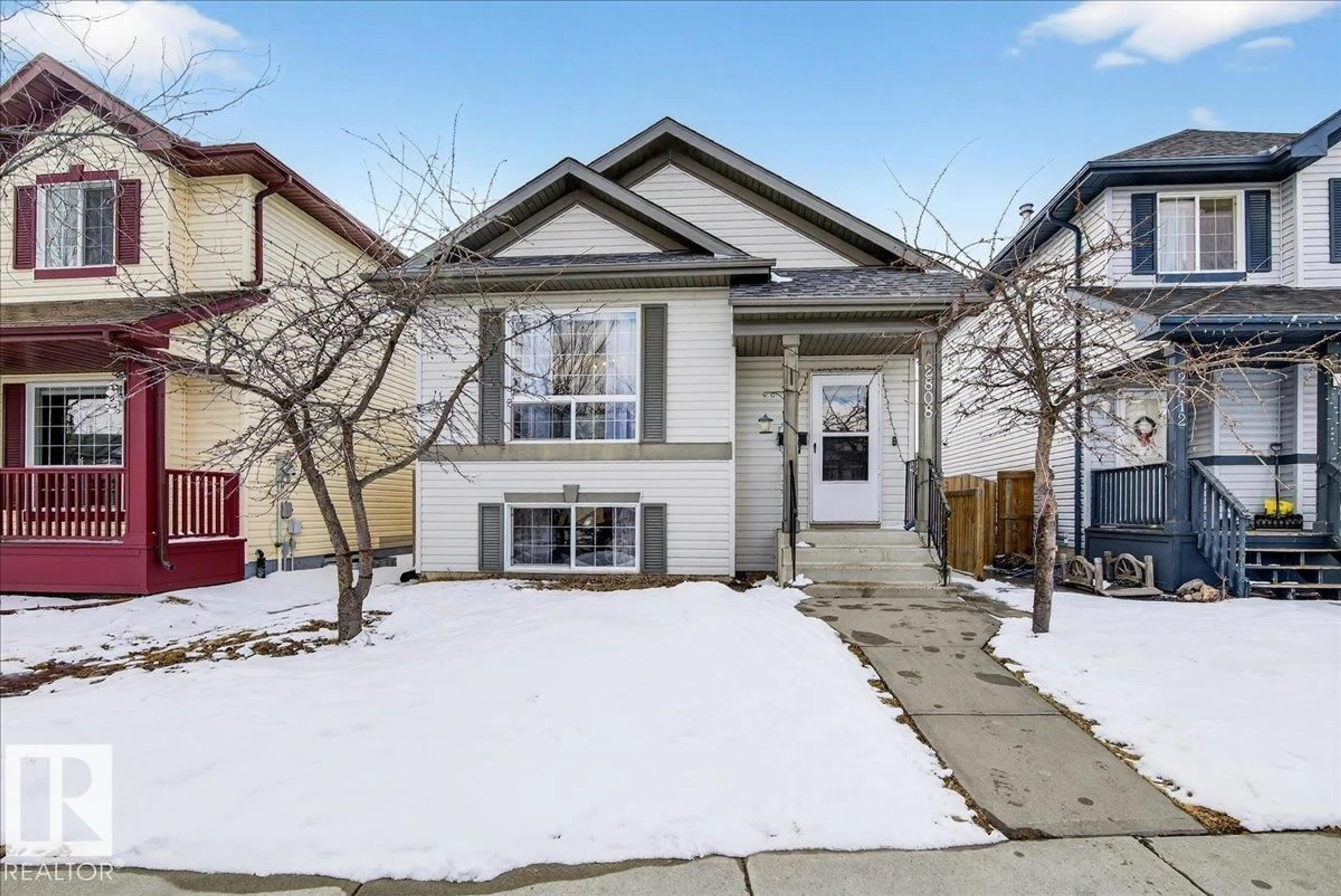 Home with vinyl exterior material, street for 2808 25 ST, Edmonton Alberta T6T2A3