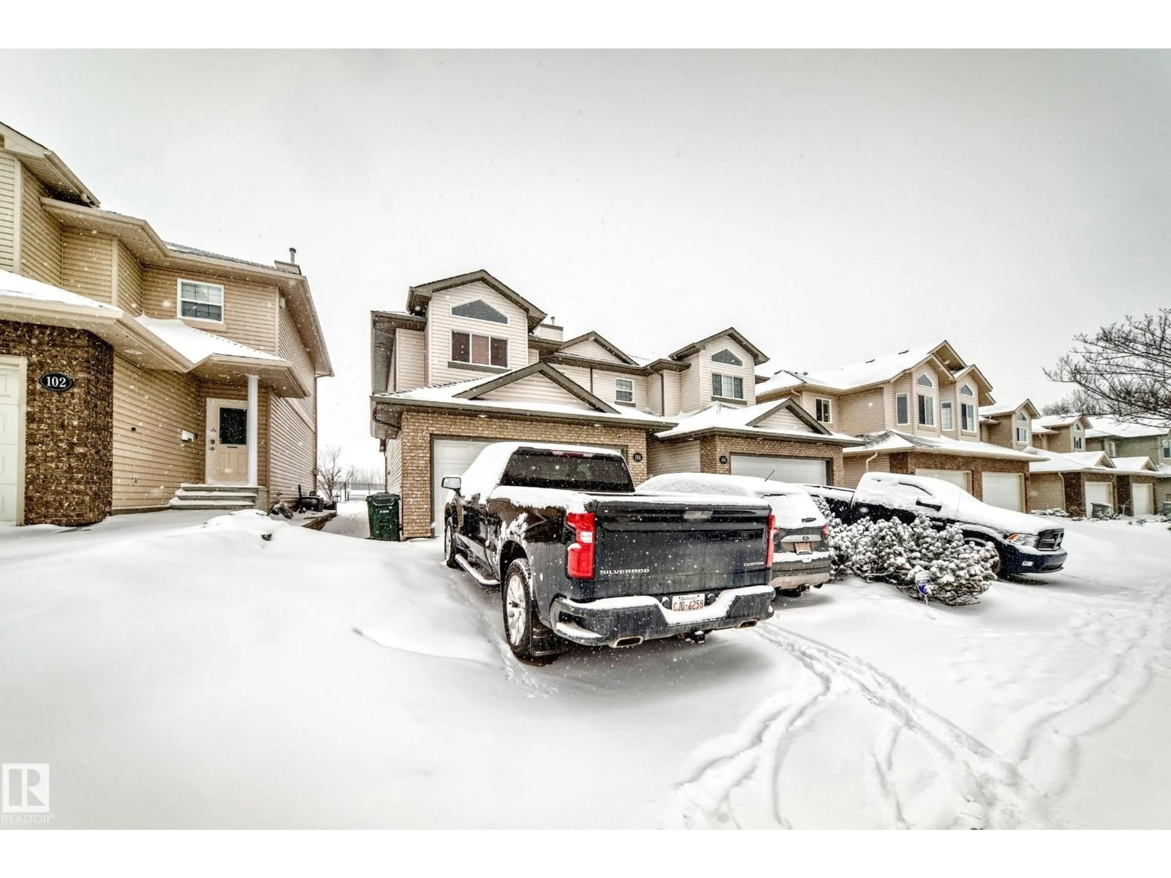 A pic from outside/outdoor area/front of a property/back of a property/a pic from drone, street for 104 WESTERRA BV, Stony Plain Alberta T5Z2Z7