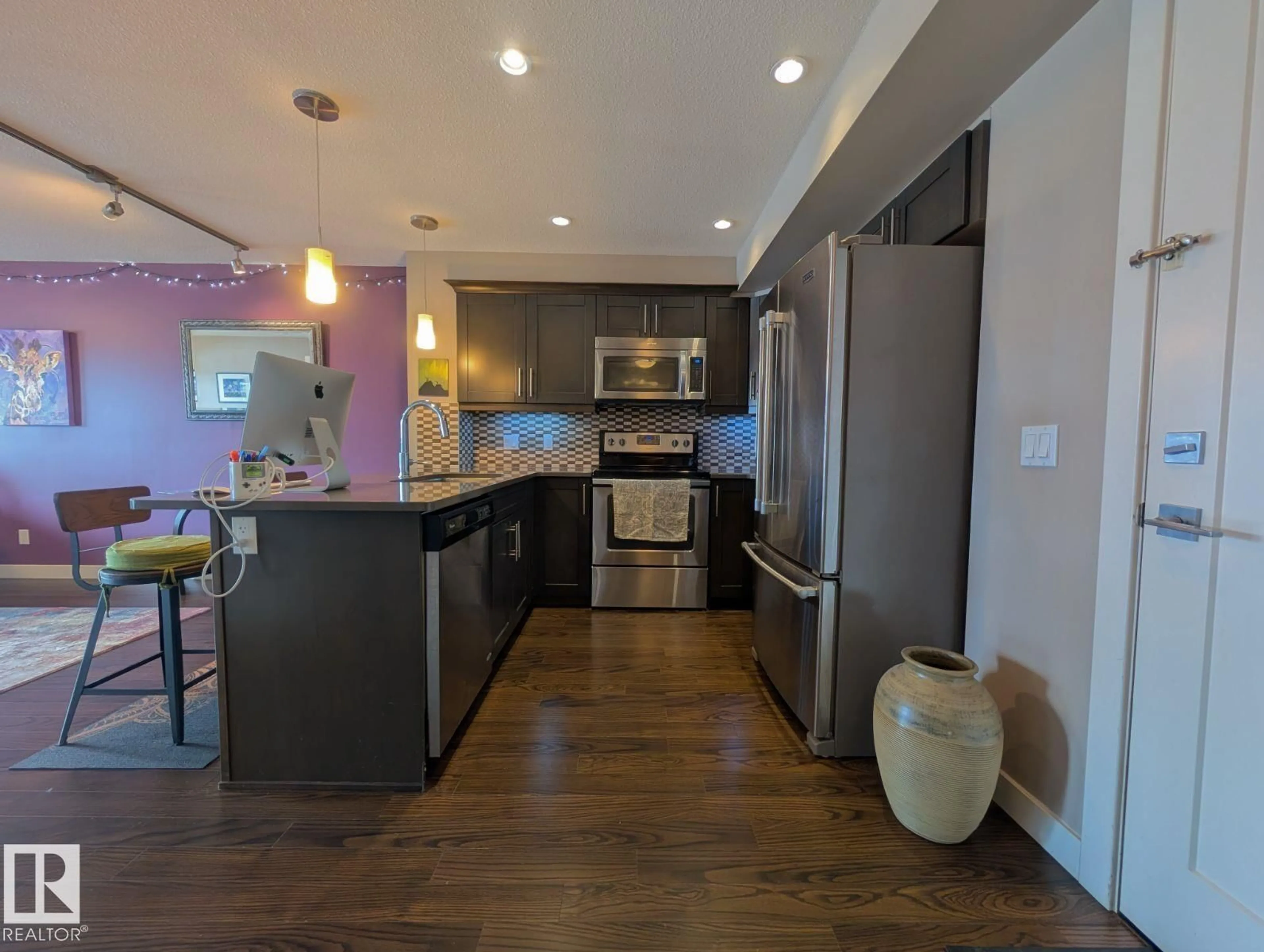 Open concept kitchen, unknown for #208 - 1031 173 ST, Edmonton Alberta T6W3E4