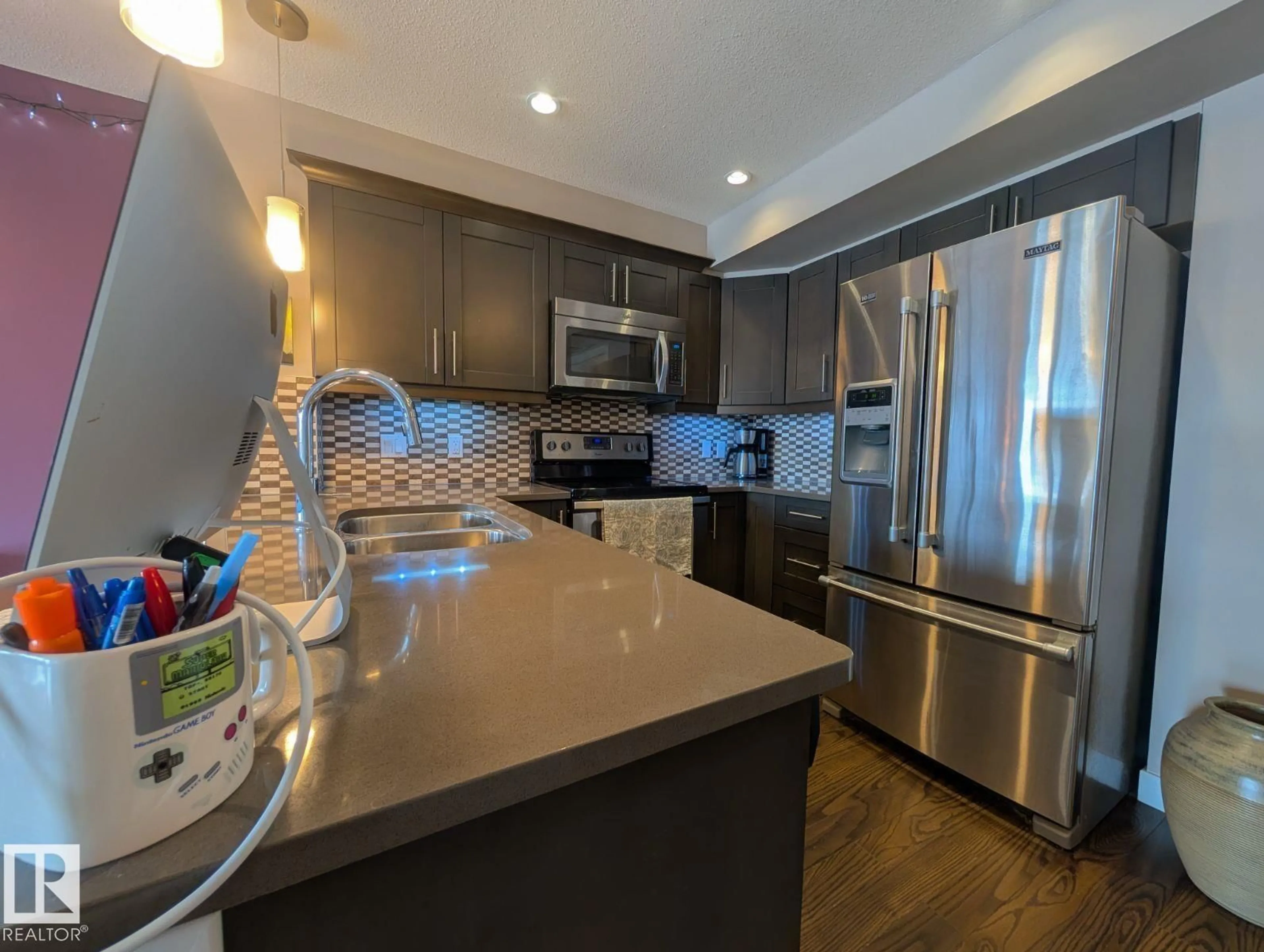 Open concept kitchen, unknown for #208 - 1031 173 ST, Edmonton Alberta T6W3E4