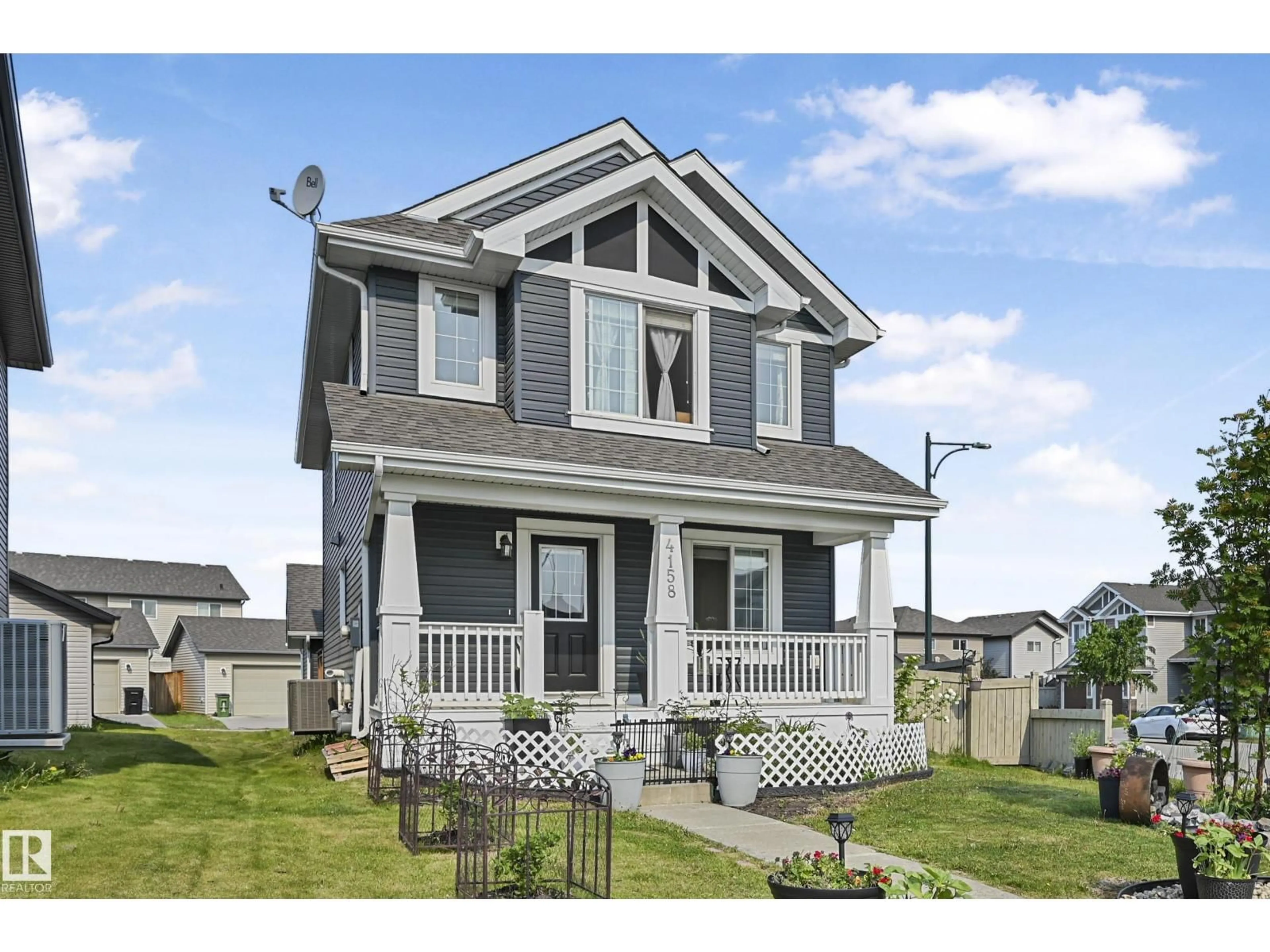 Home with vinyl exterior material, street for 4158 6A ST, Edmonton Alberta T6T0W9