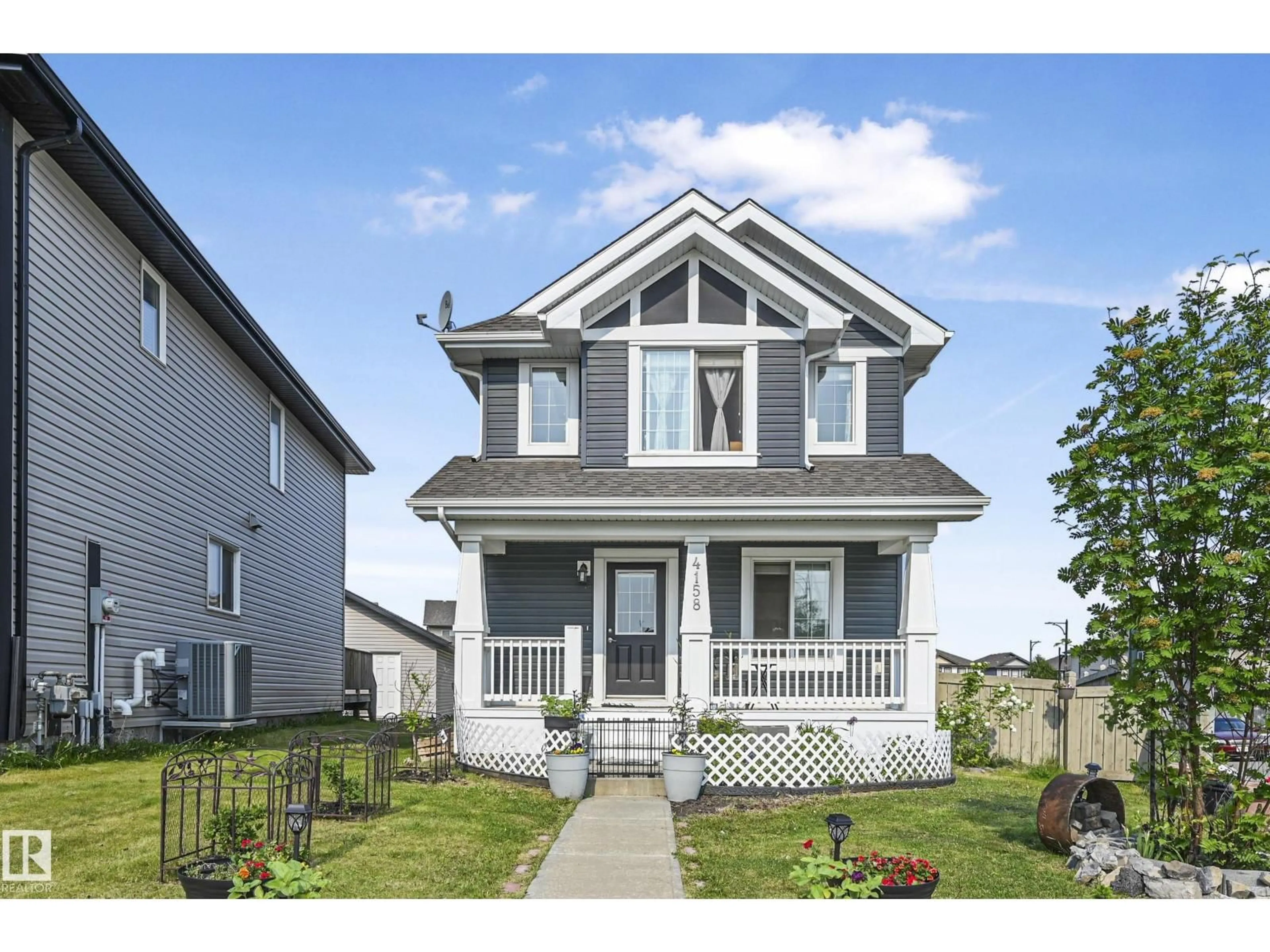 Home with vinyl exterior material, street for 4158 6A ST, Edmonton Alberta T6T0W9