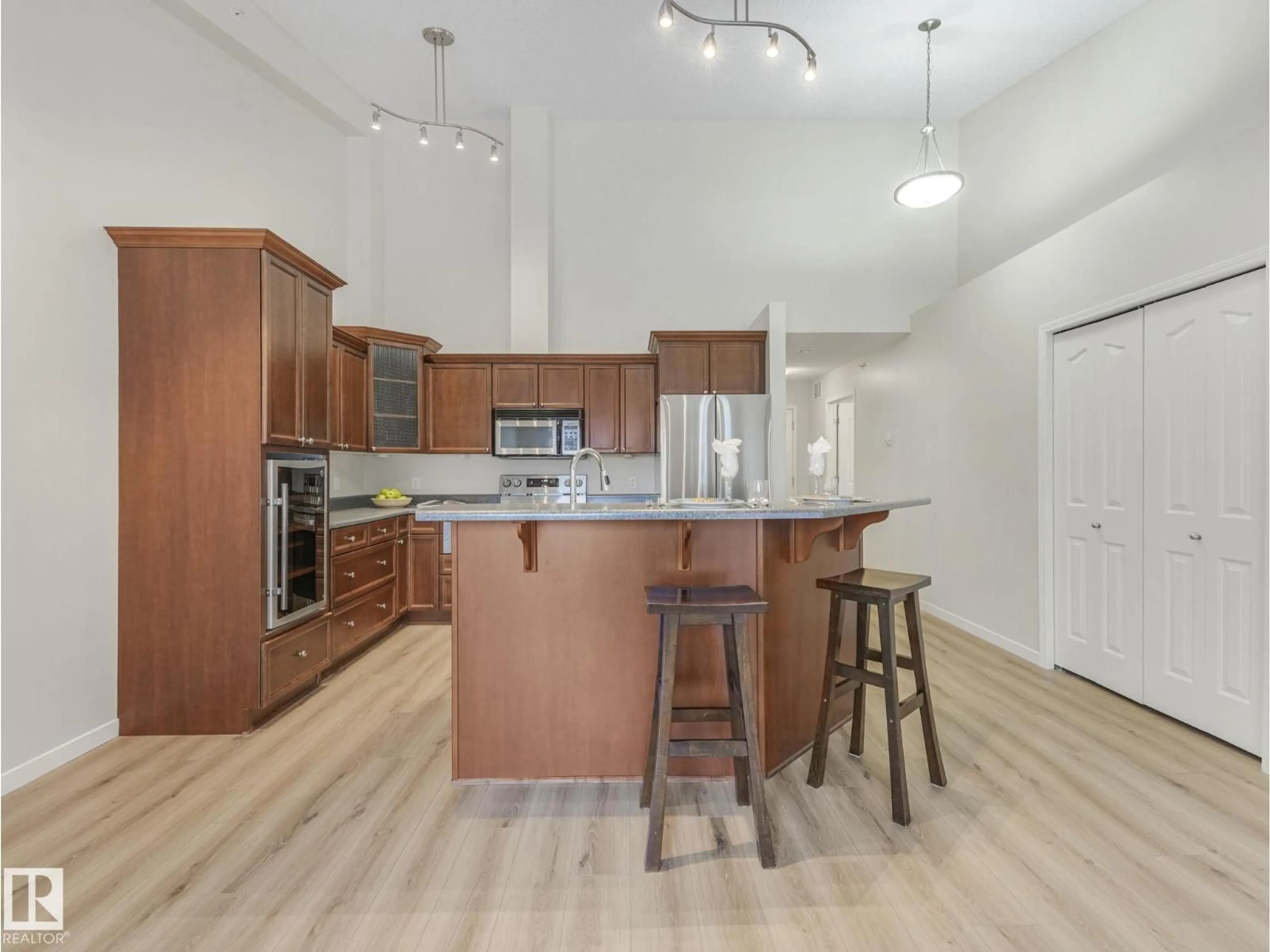 Open concept kitchen, unknown for 515 10311 111 ST NW, Edmonton Alberta T5K2Y8