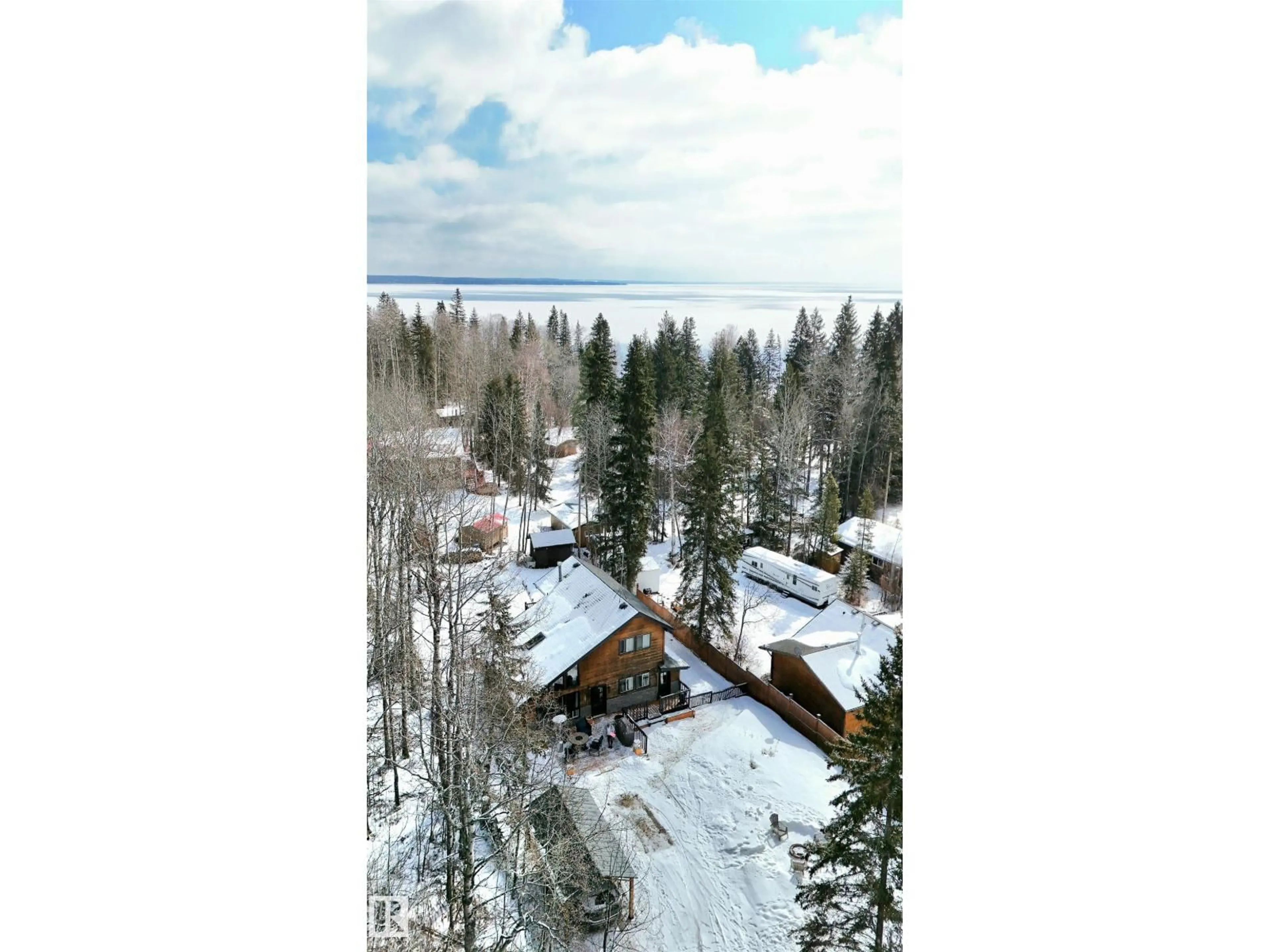 A pic from outside/outdoor area/front of a property/back of a property/a pic from drone, unknown for 2001 TWP47 - 2110 MITCHELL BE, Rural Leduc County Alberta T0C2P0