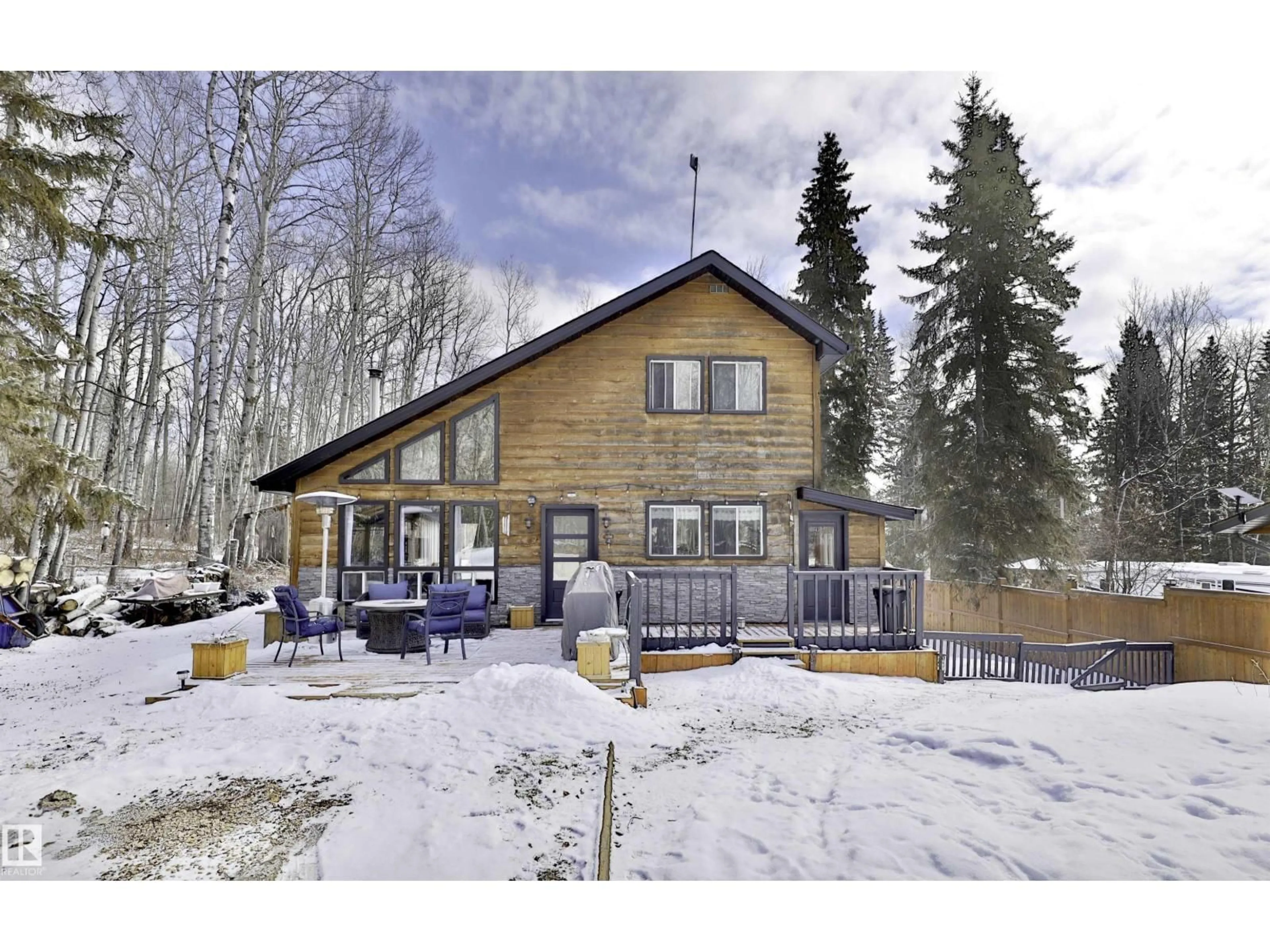 A pic from outside/outdoor area/front of a property/back of a property/a pic from drone, unknown for 2001 TWP47 - 2110 MITCHELL BE, Rural Leduc County Alberta T0C2P0