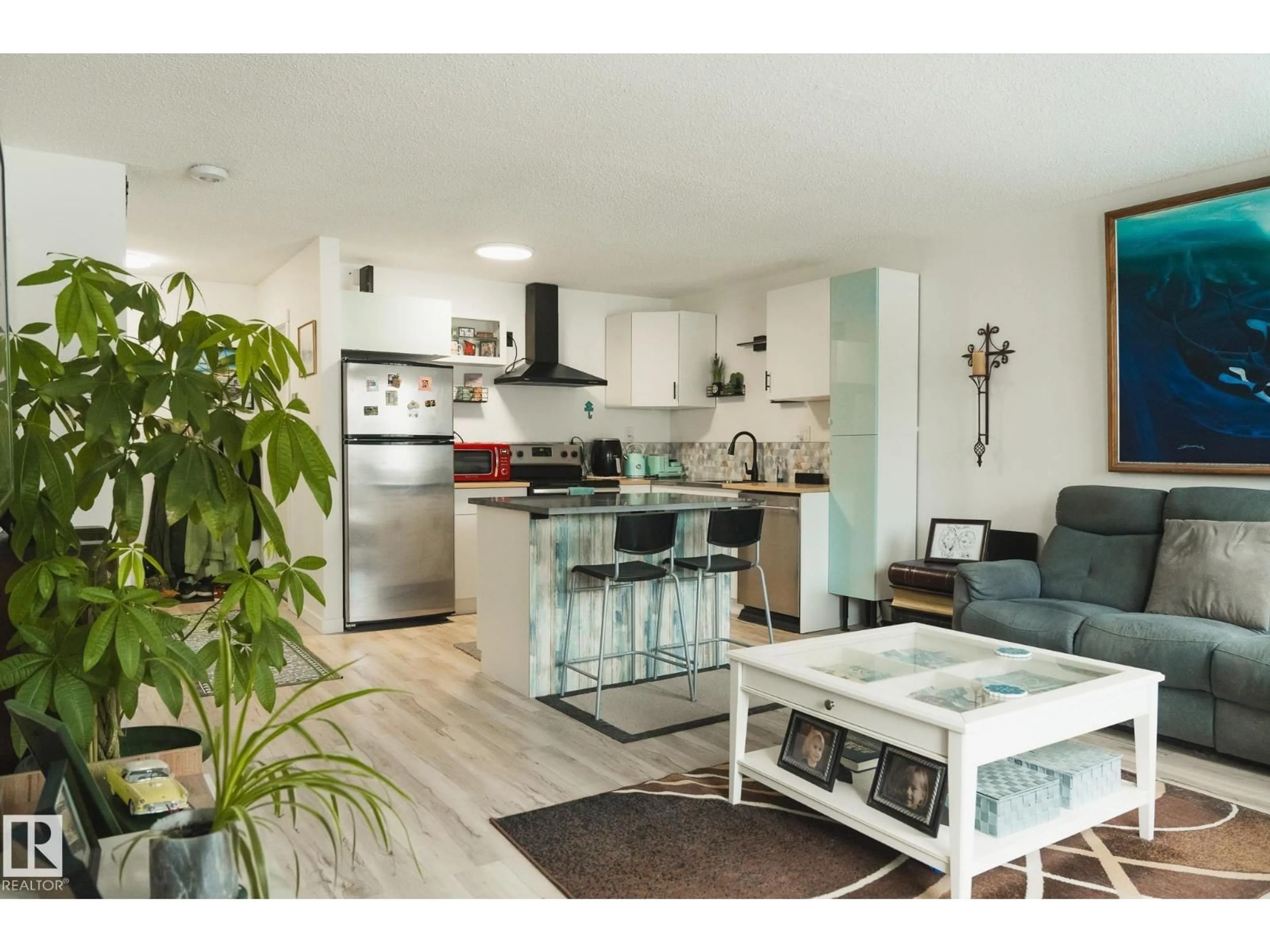 Open concept kitchen, wood/laminate floor for #303 - 10432 76 AV, Edmonton Alberta T6E1L1