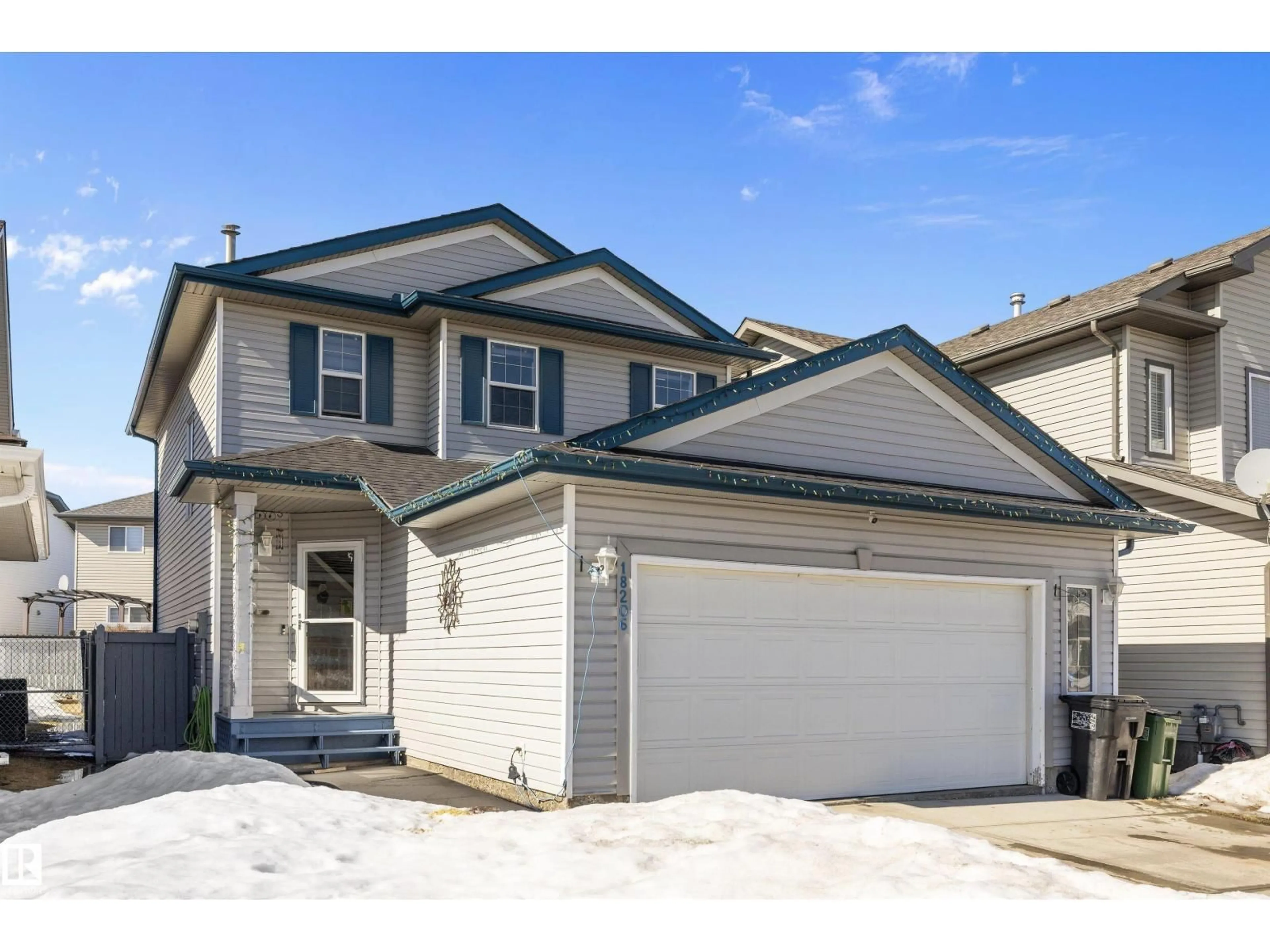 Home with vinyl exterior material, street for NW - 18206 108 ST, Edmonton Alberta T5X6E1